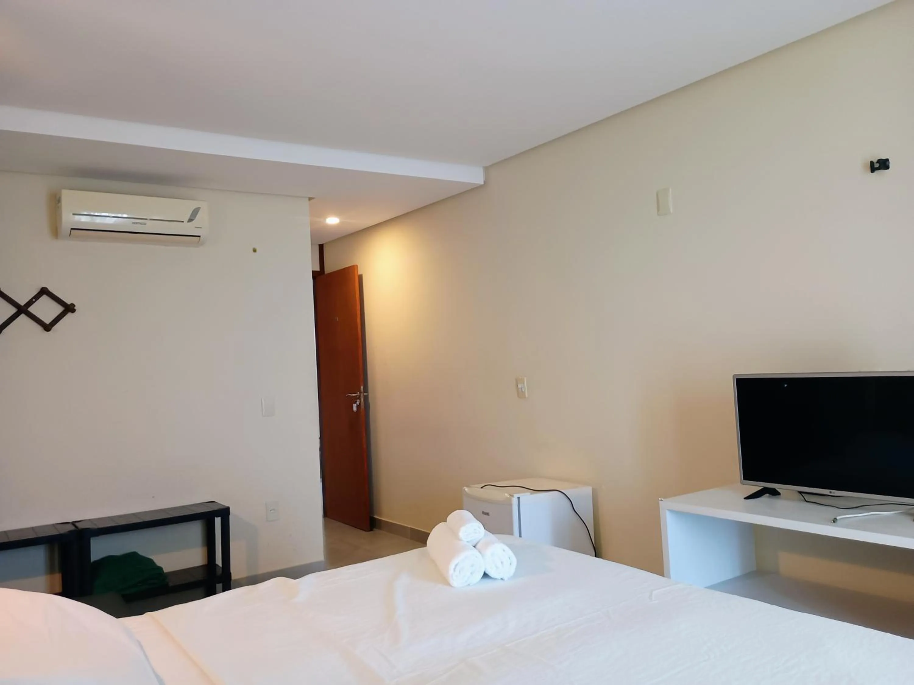 Photo of the whole room, Bed in Pousada Laguna