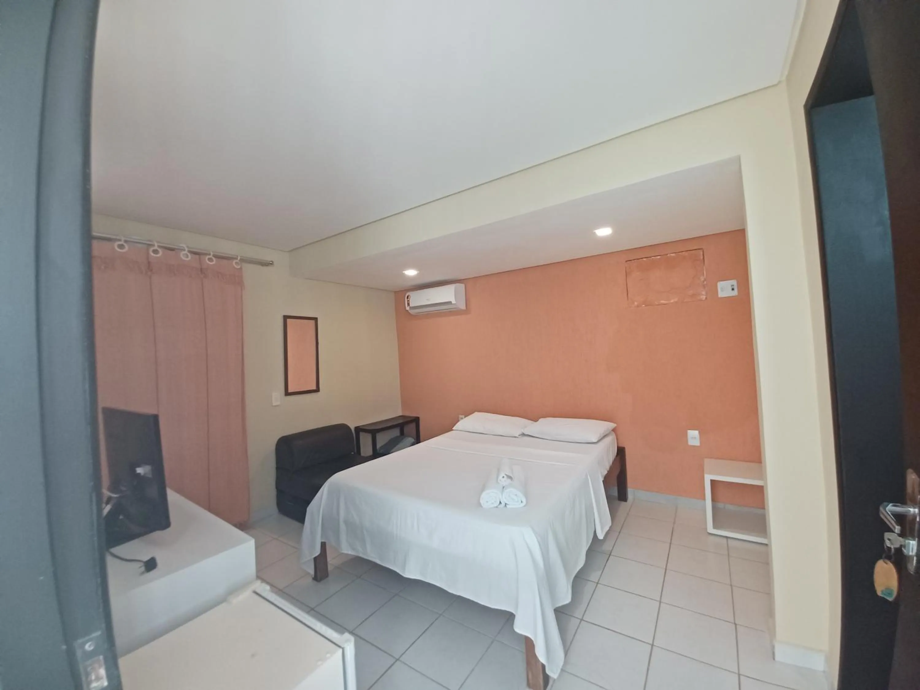 Bed in Pousada Laguna