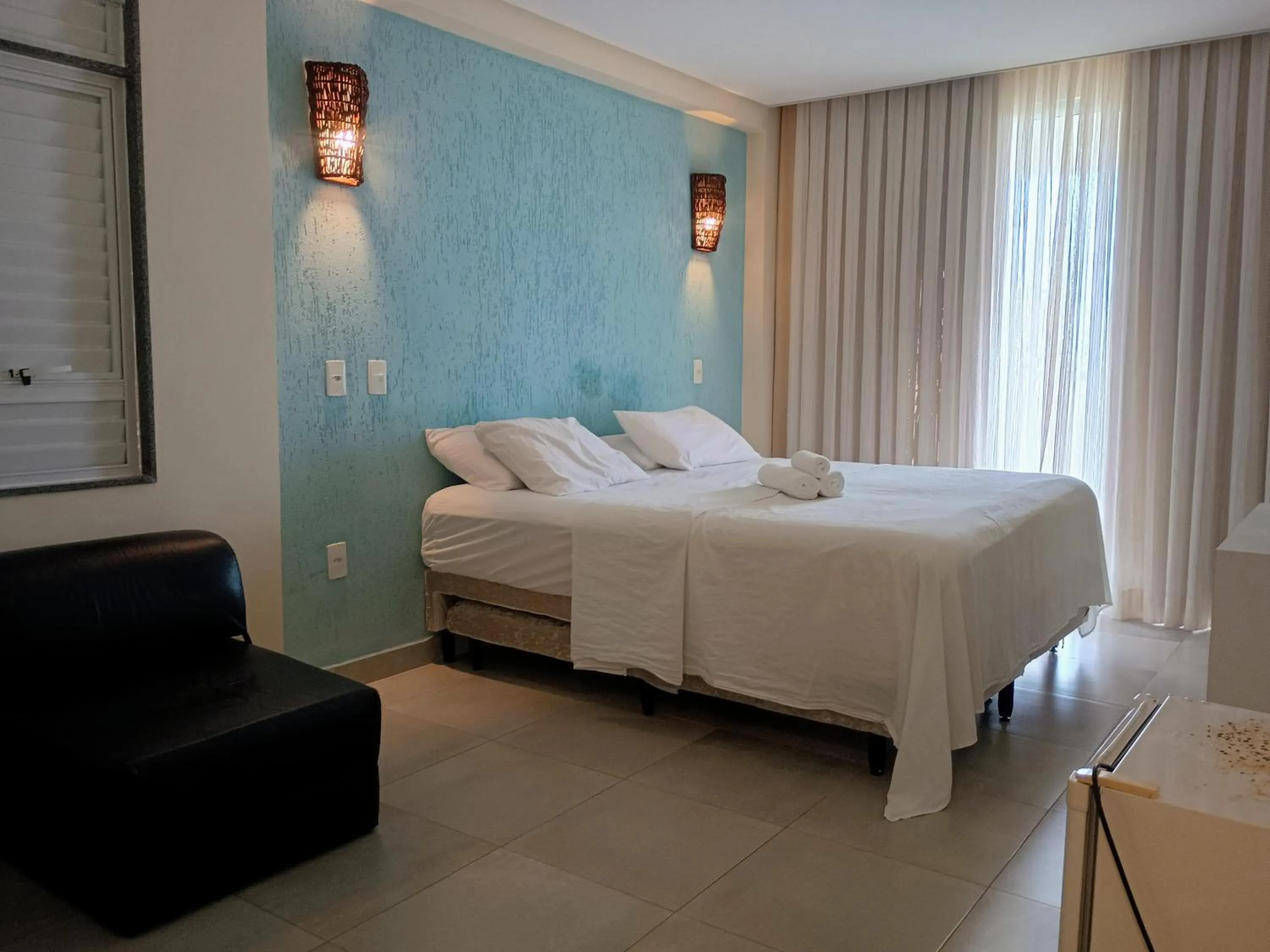 Photo of the whole room, Bed in Pousada Laguna