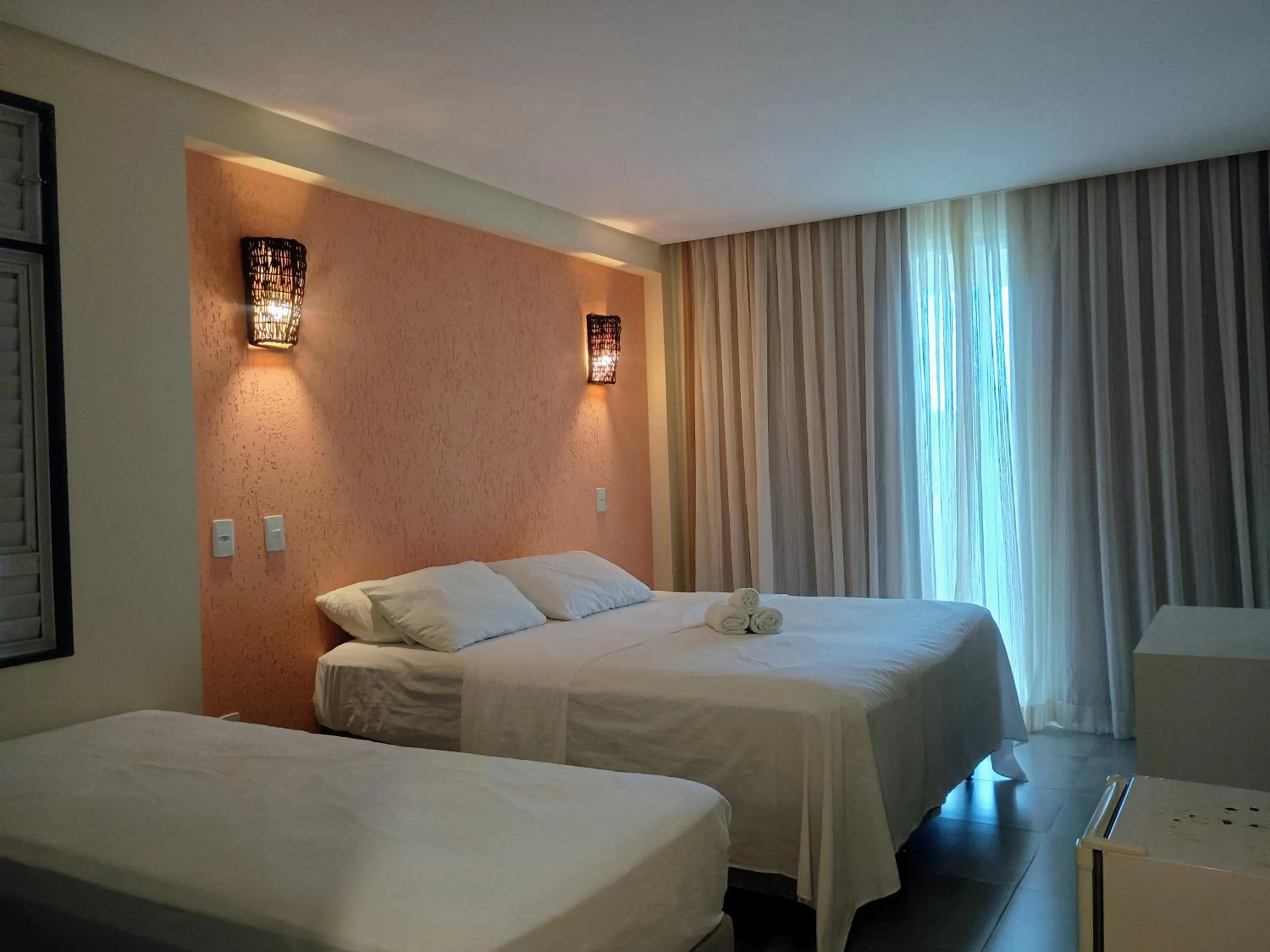 Photo of the whole room, Bed in Pousada Laguna