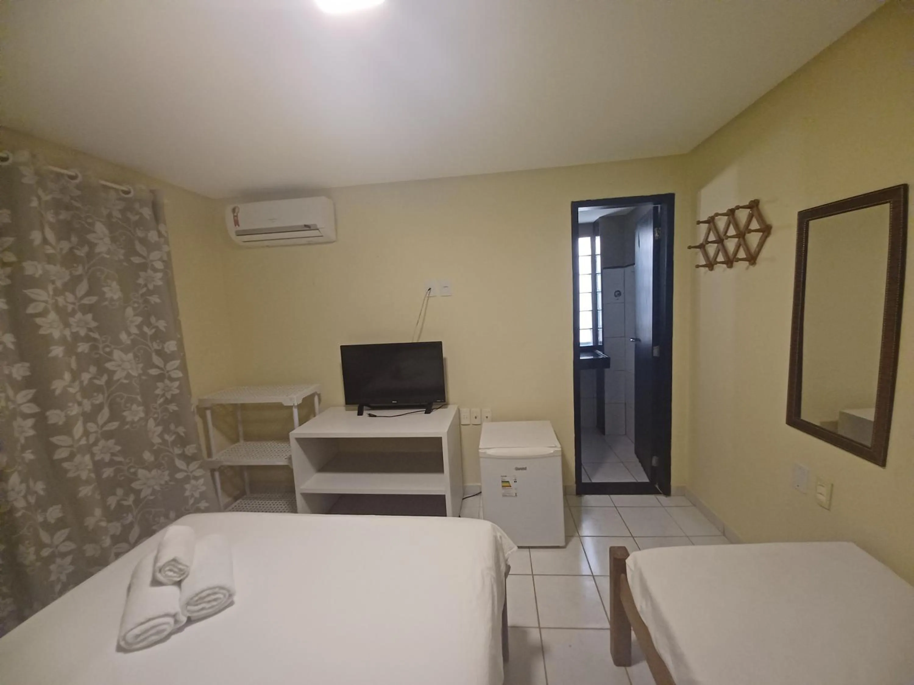 Bed in Pousada Laguna