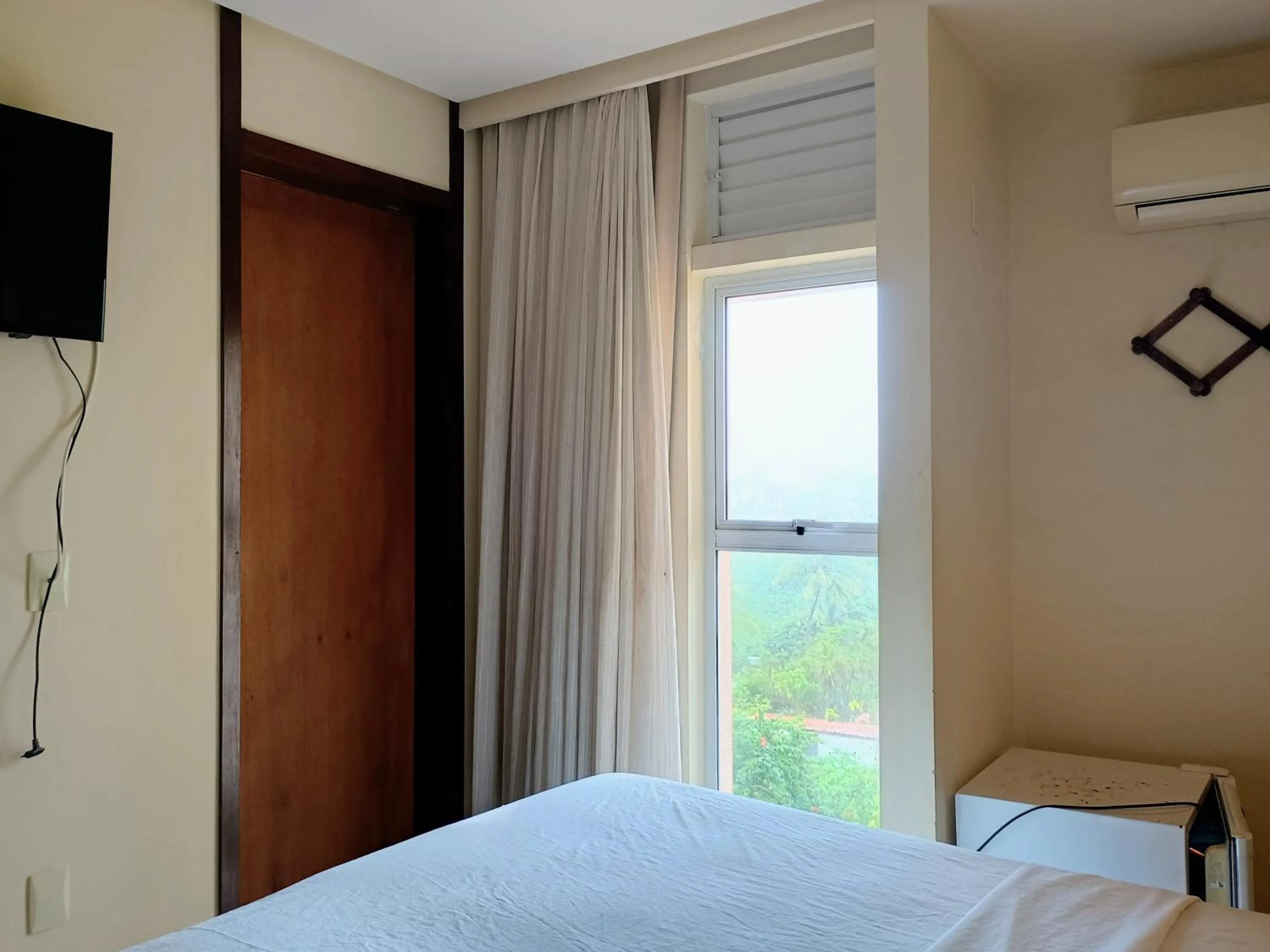 Photo of the whole room, Bed in Pousada Laguna