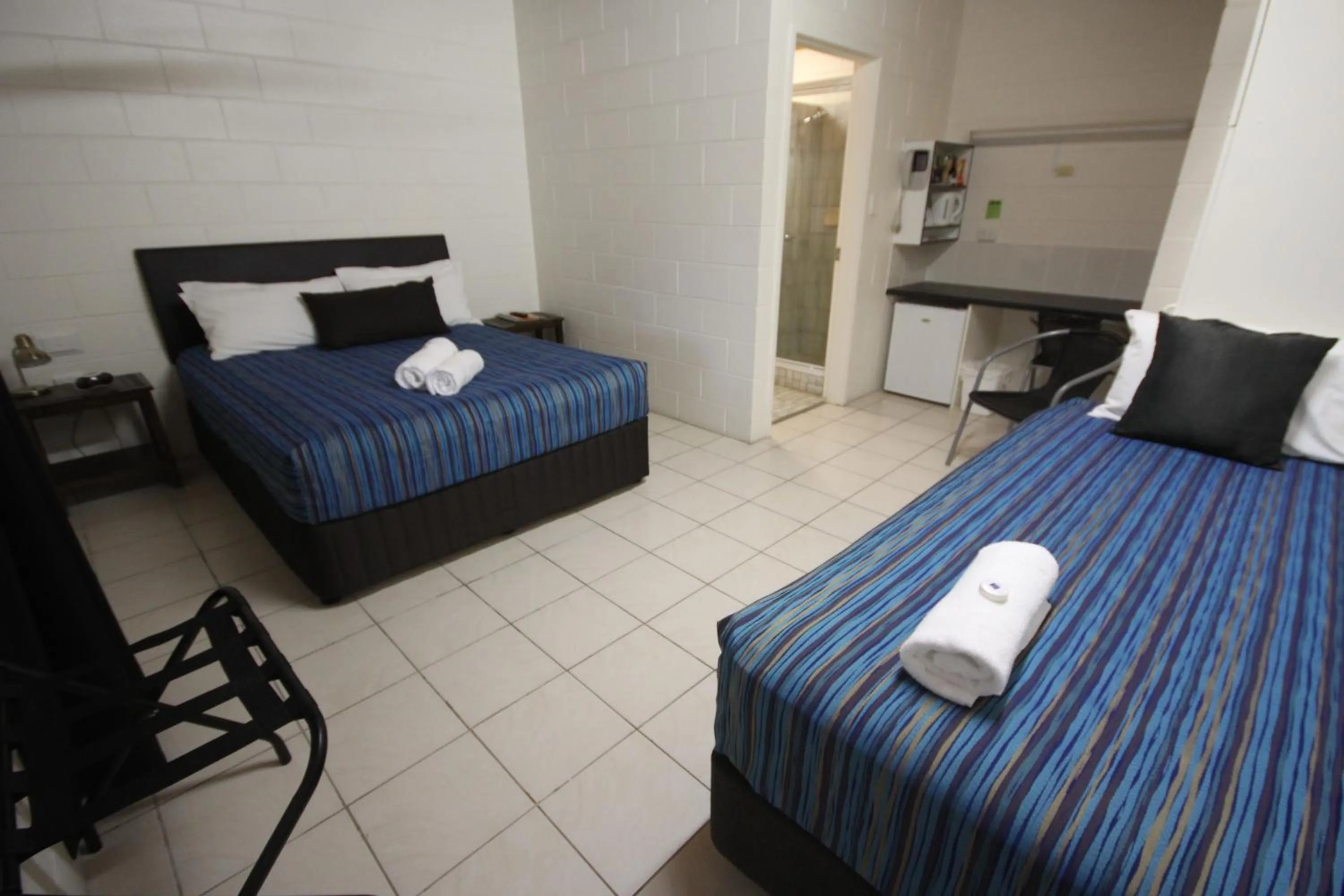 Bed in Barrier Reef Motel Innisfail