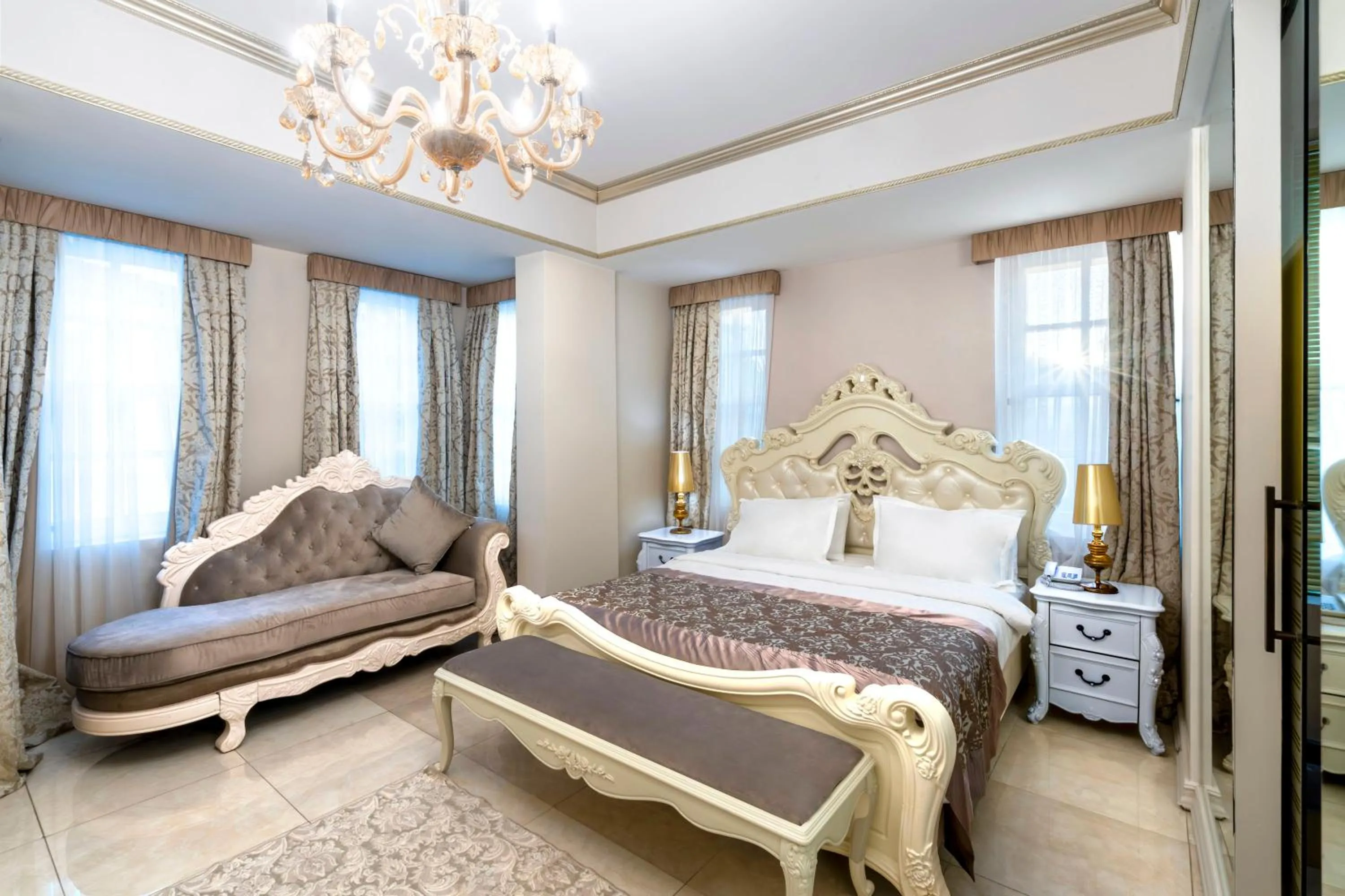 Bed in Elegance East Hotel