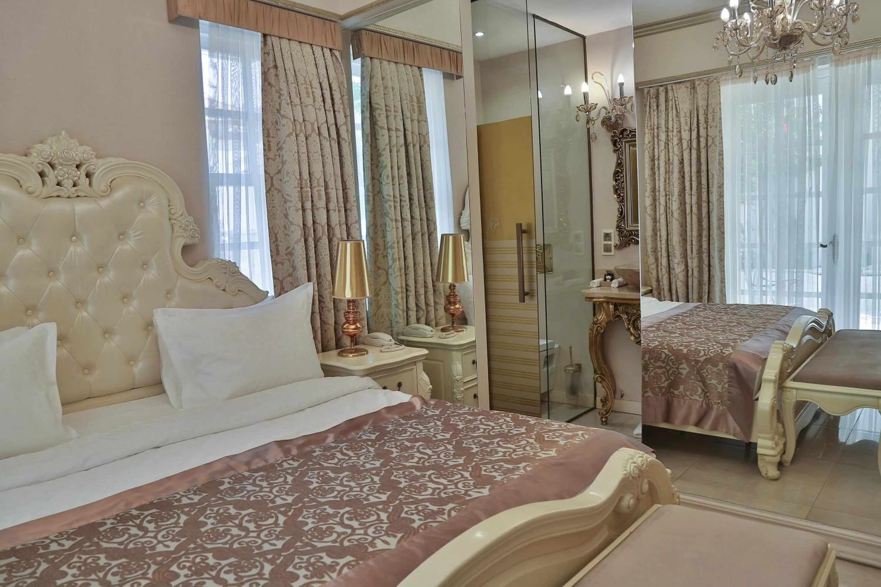 Bed in Elegance East Hotel