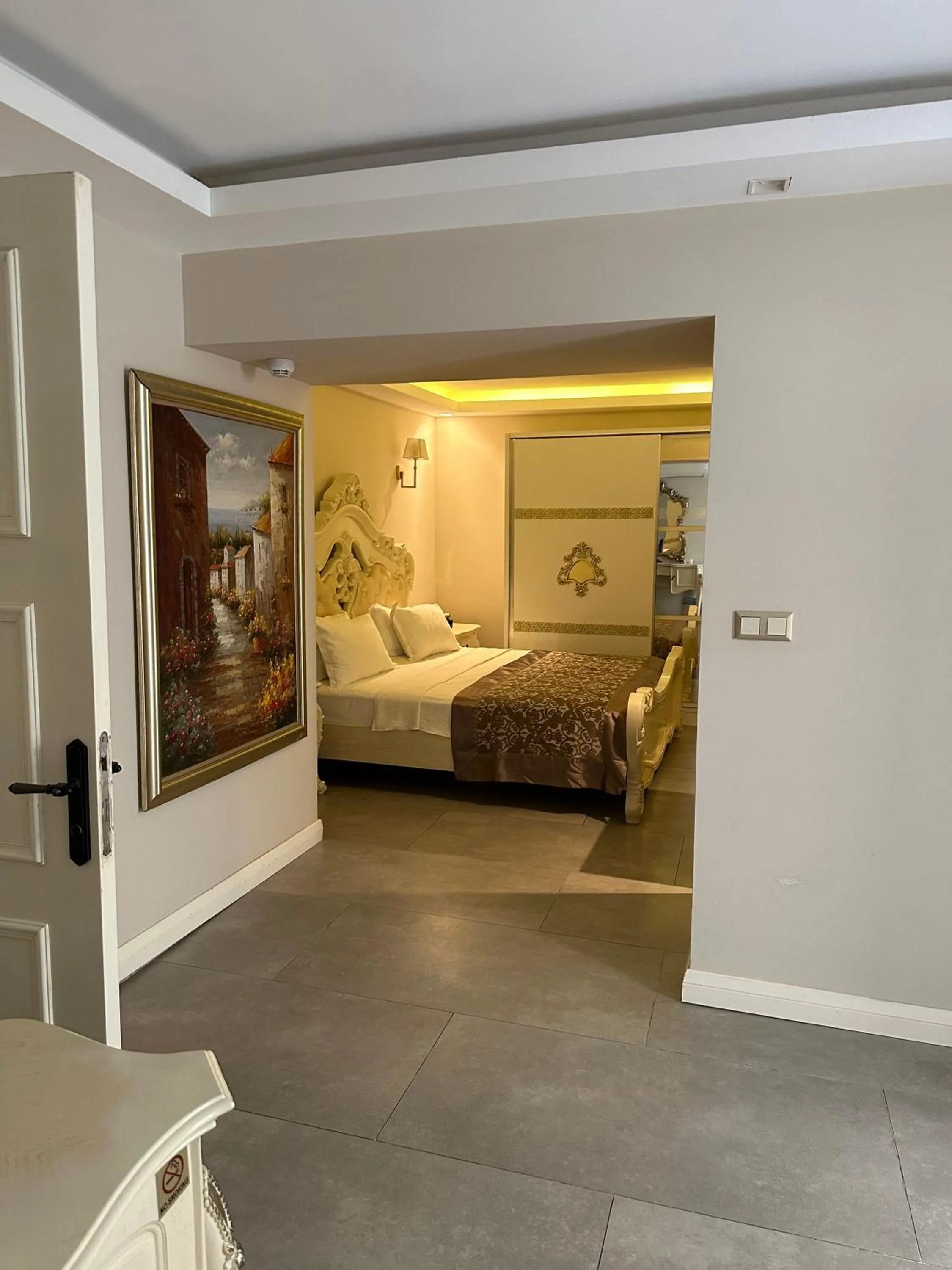 Bed in Elegance East Hotel