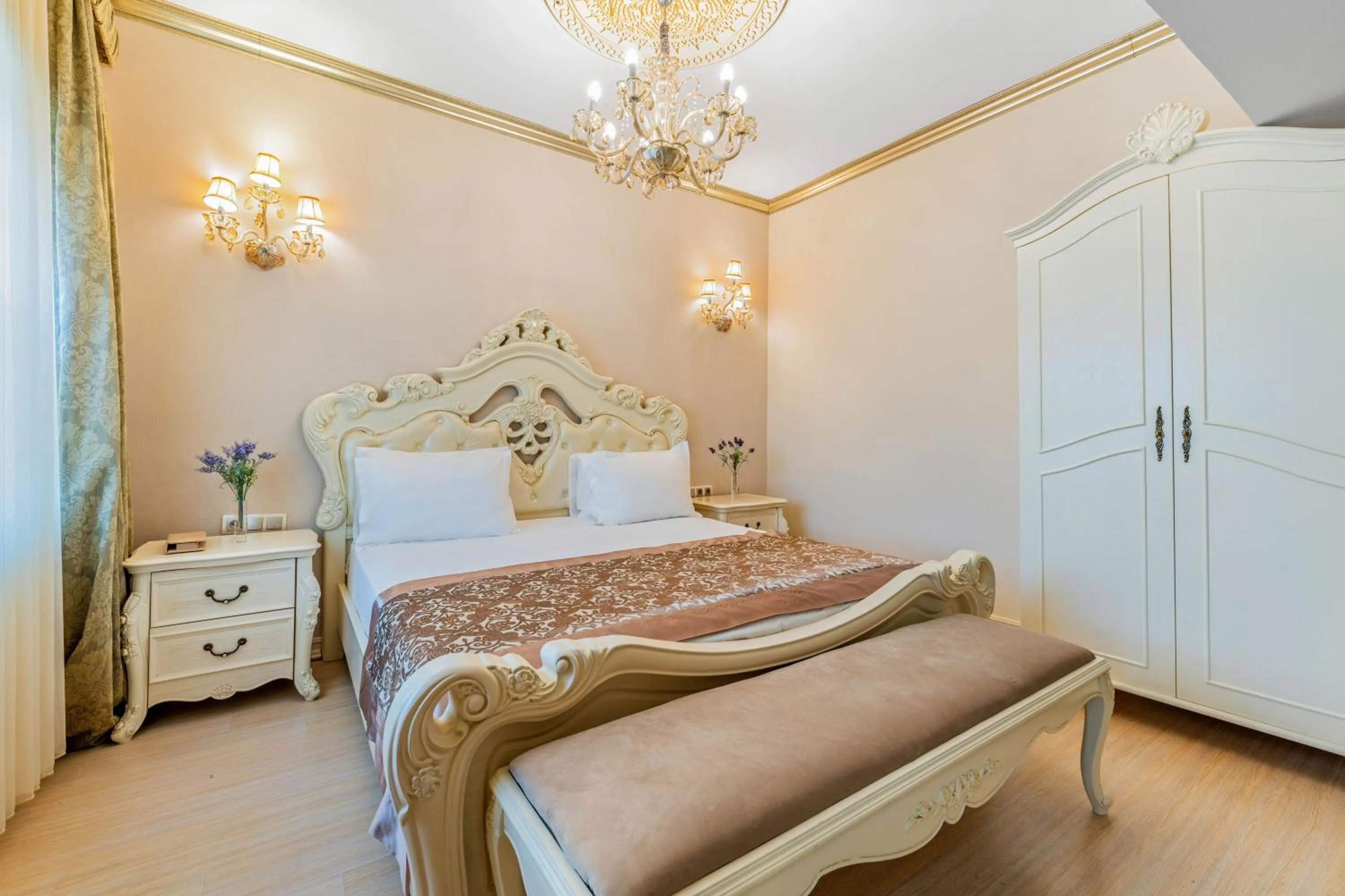 Bed in Elegance East Hotel