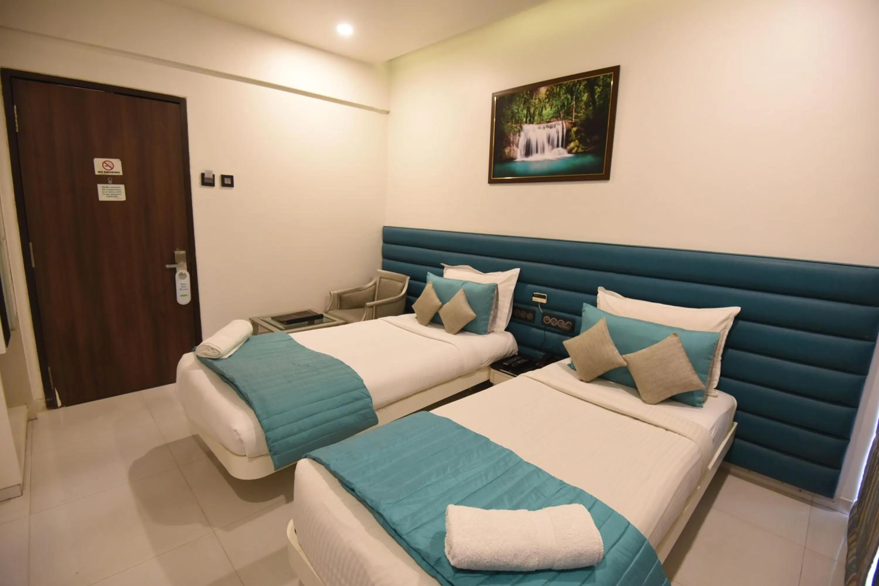 Seating area, Bed in VITS Sharanam, Thane