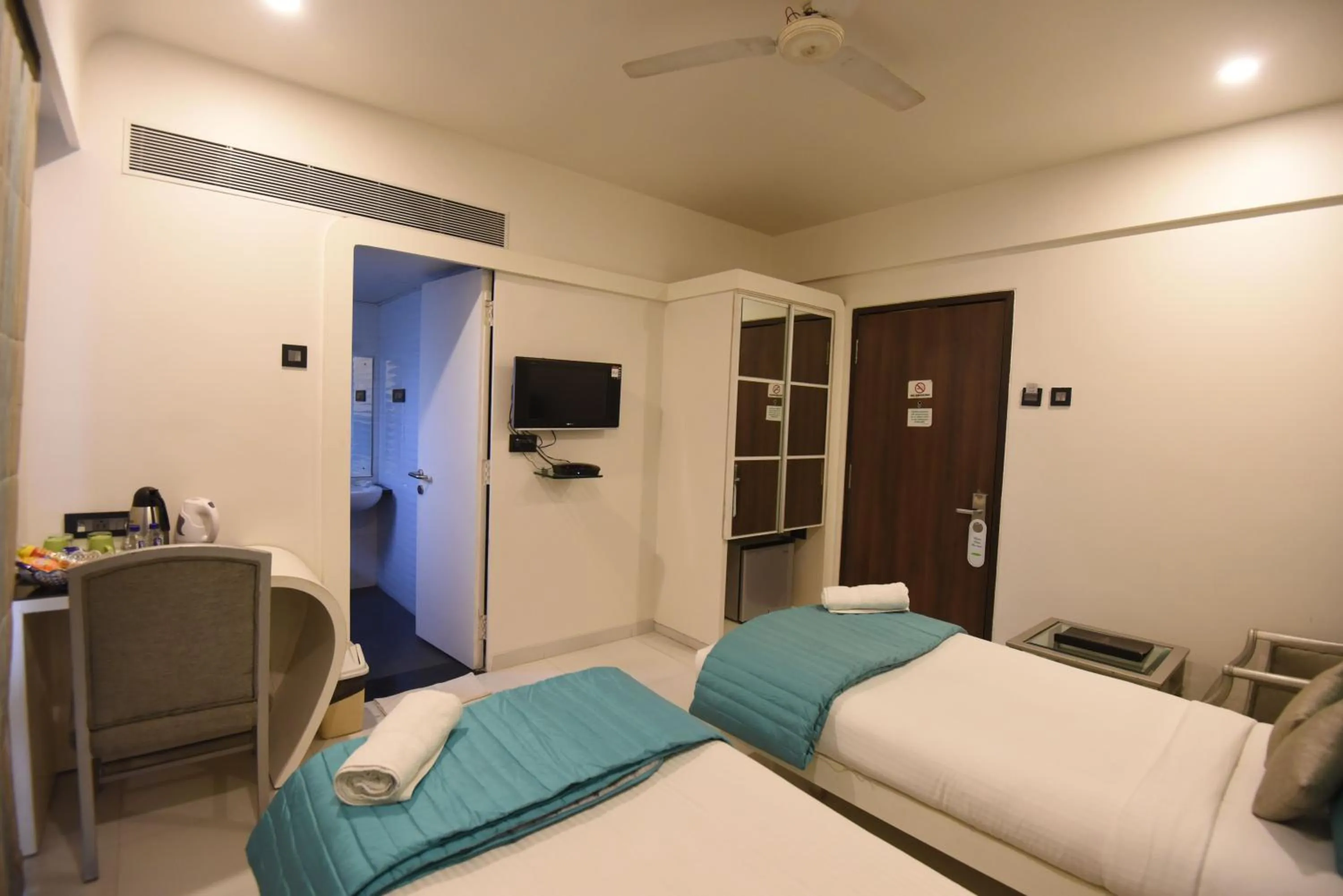 Seating area, Bed in VITS Sharanam, Thane