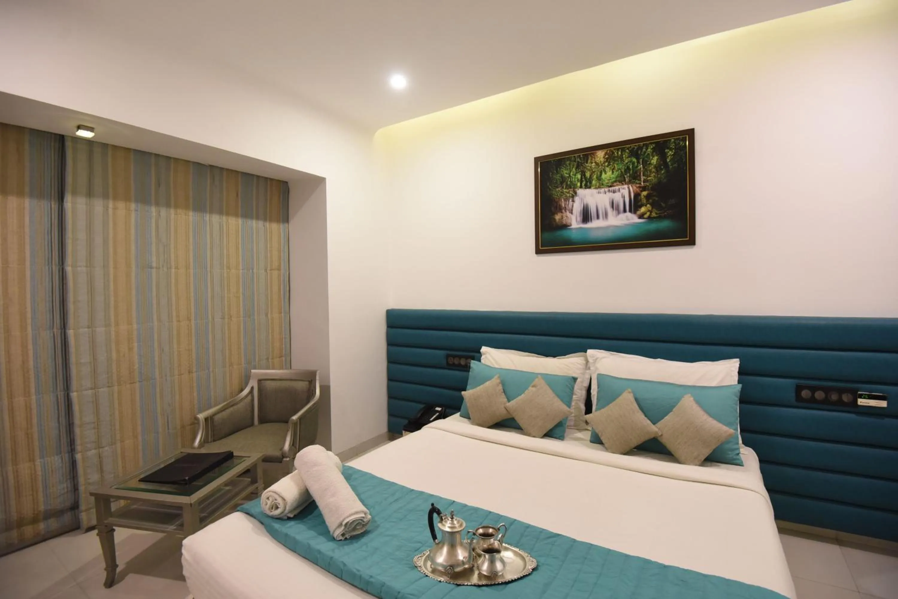 Seating area, Bed in VITS Sharanam, Thane