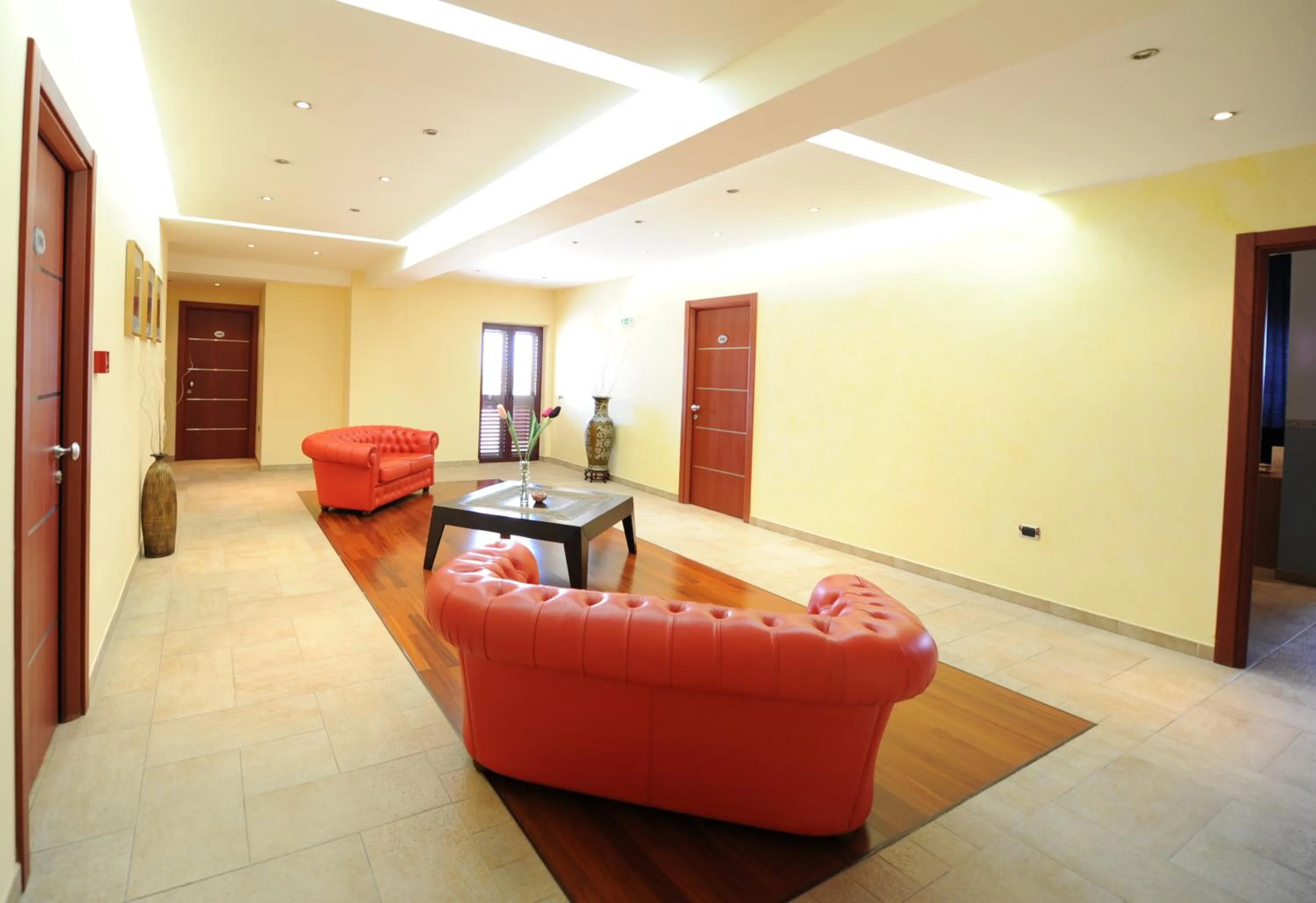 Communal lounge/ TV room in Santa Lucia Hotel