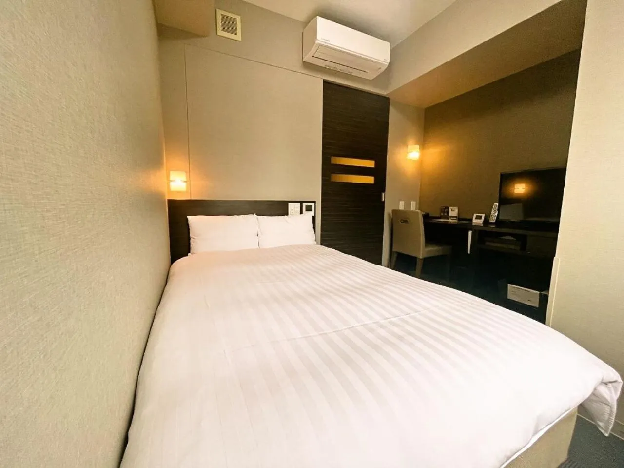 Bed in Dormy Inn Kagoshima