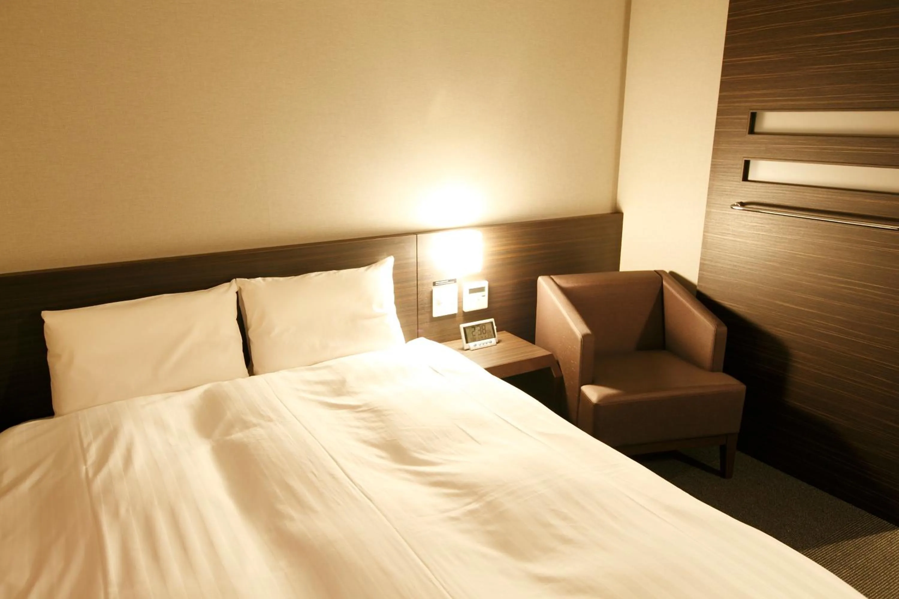 Bed in Dormy Inn Kagoshima