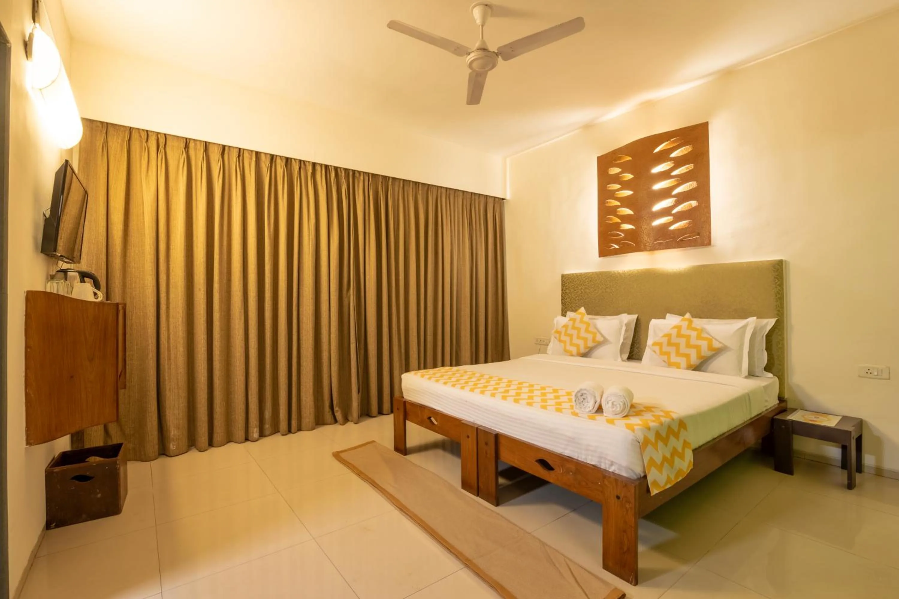 Bed in Sharanam Green Resort