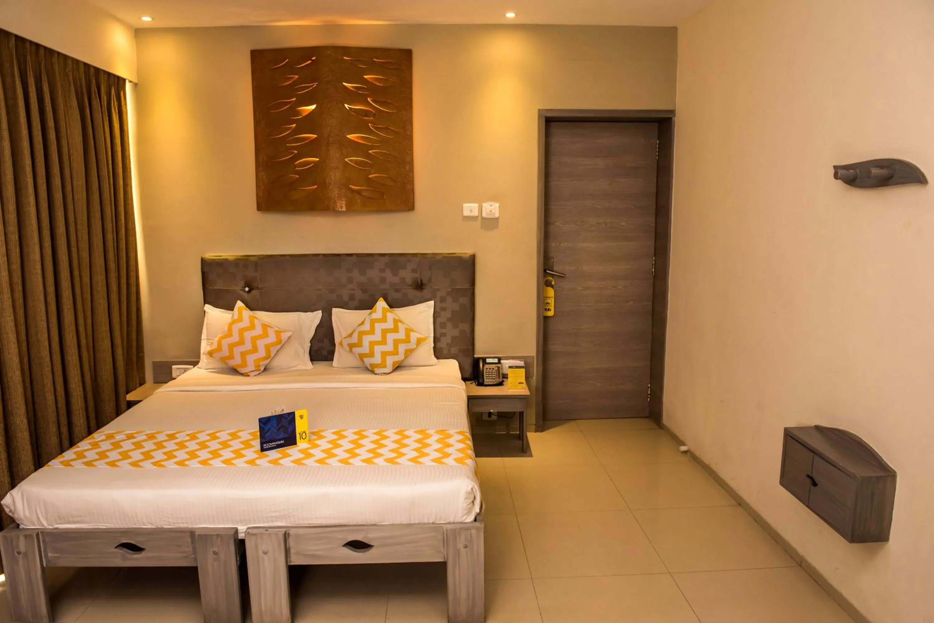 Seating area, Bed in Sharanam Green Resort