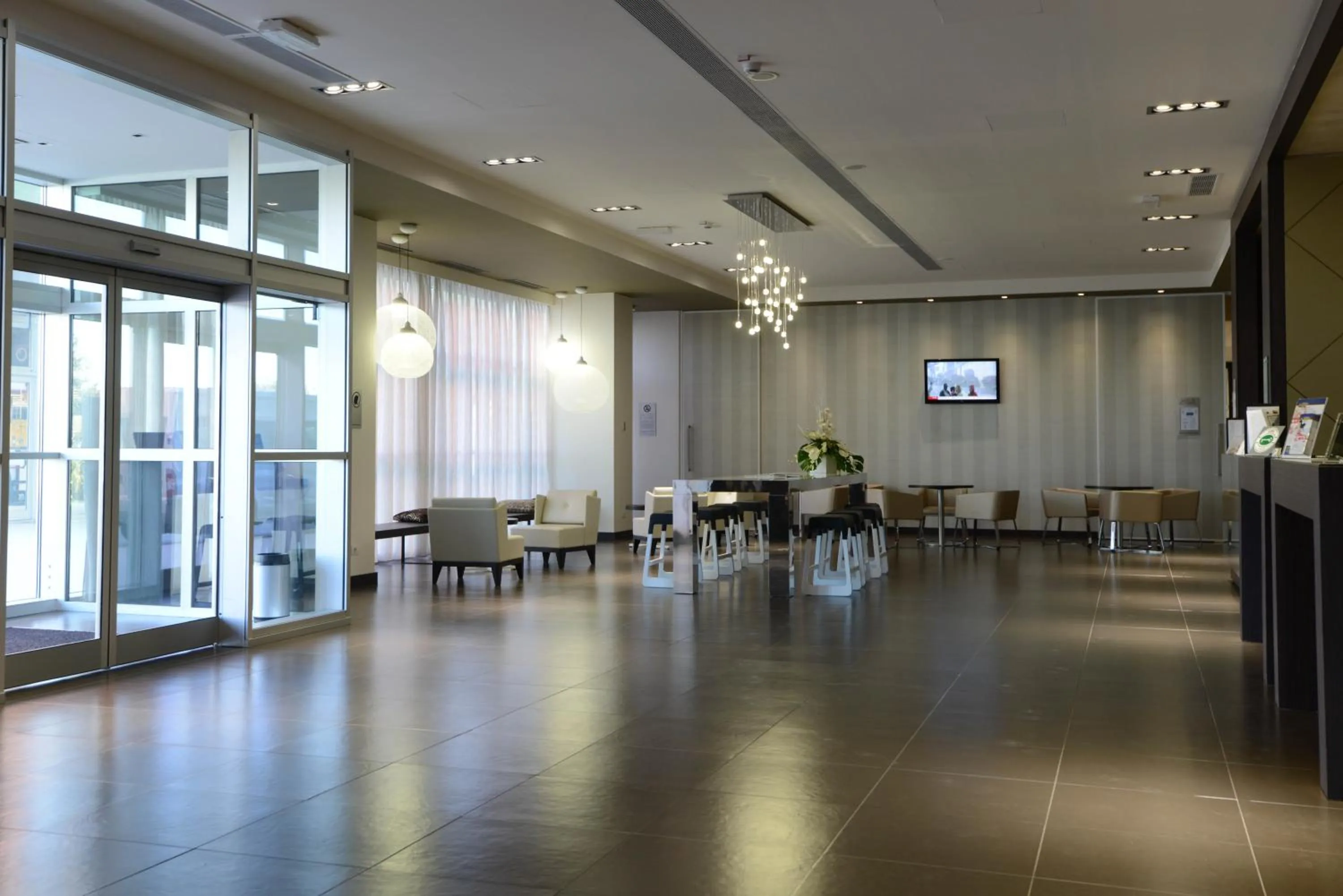 Lobby or reception in Best Western Premier CHC Airport