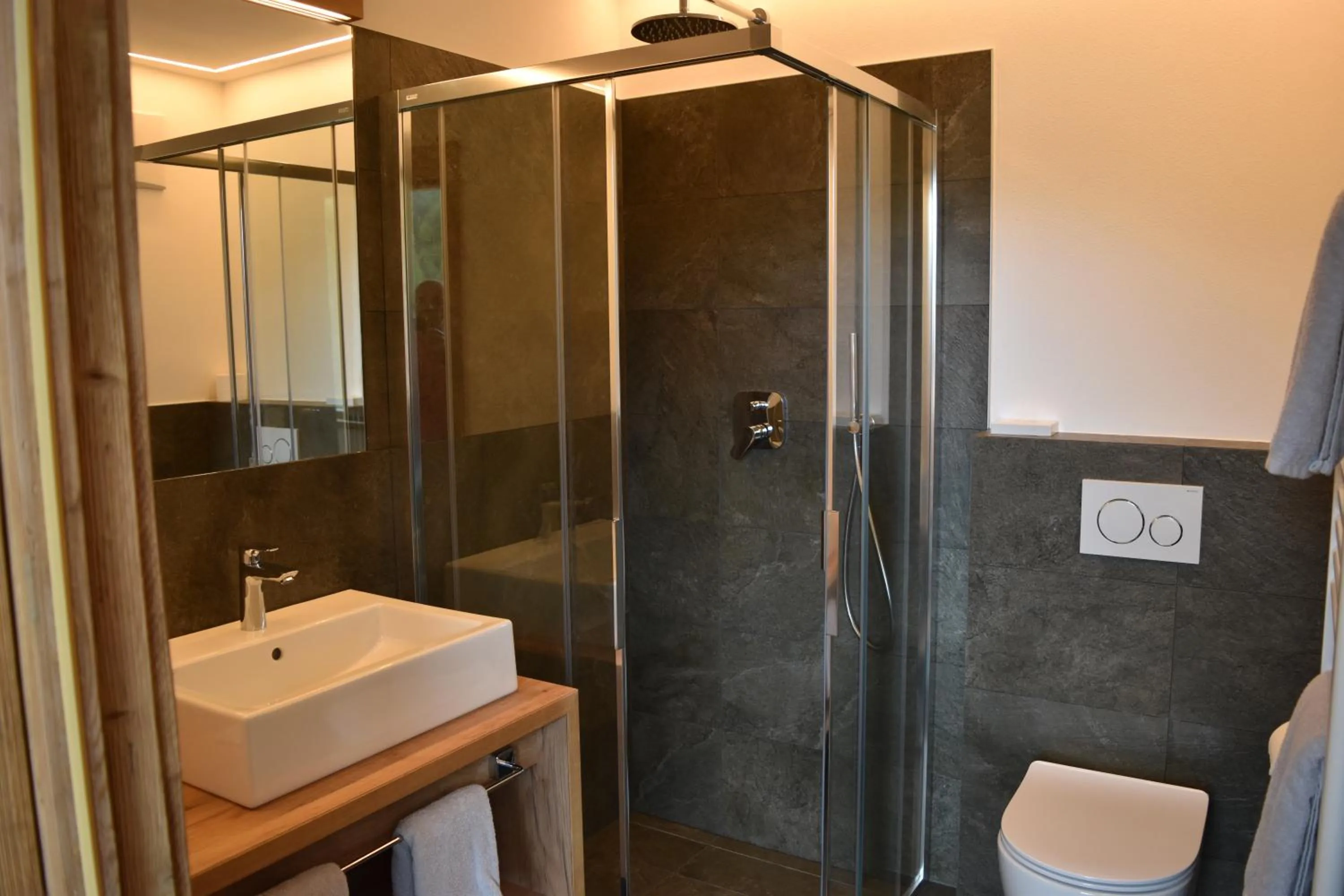 Bathroom in Garni des Alpes