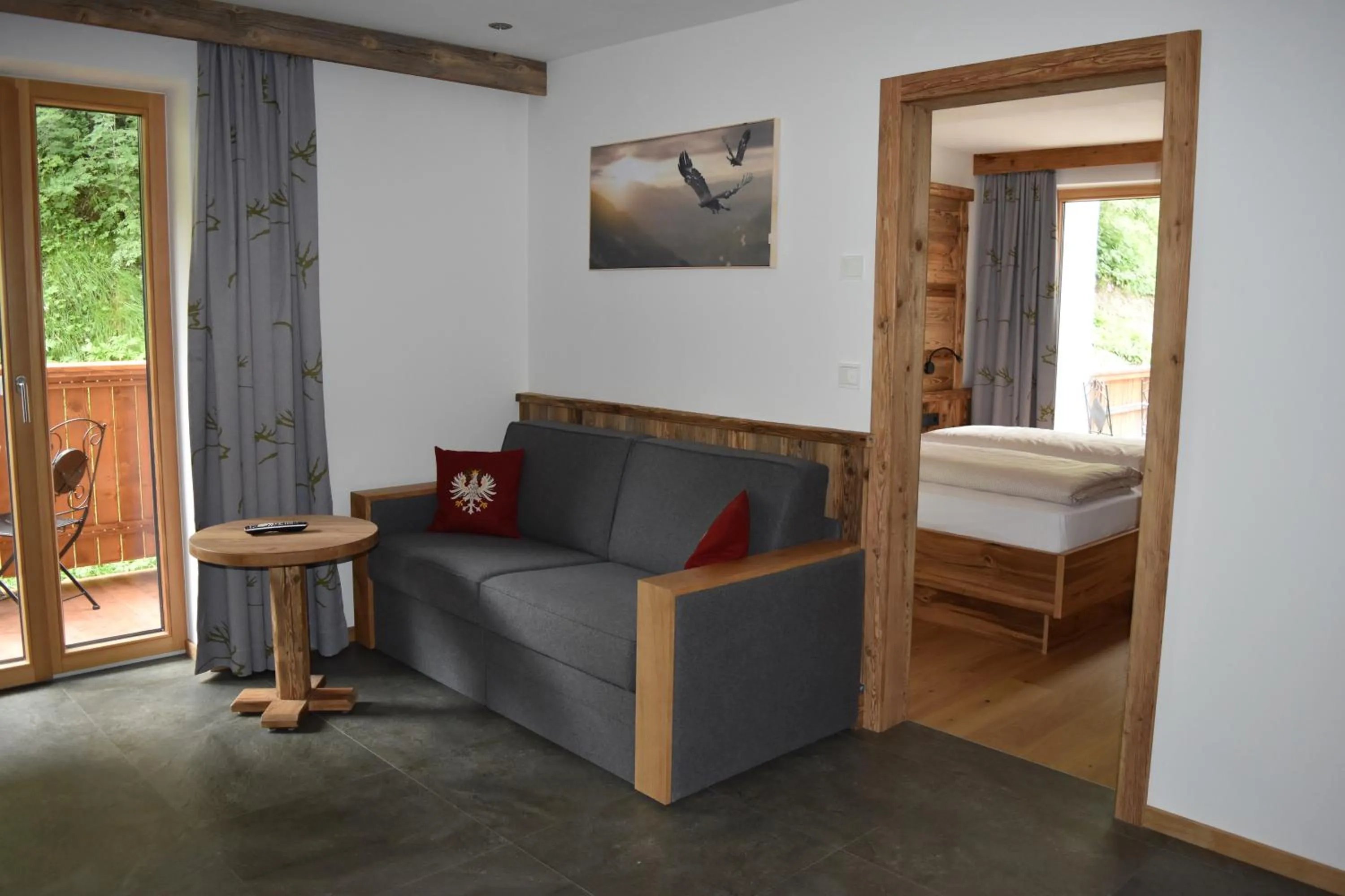 Living room, Bed in Garni des Alpes