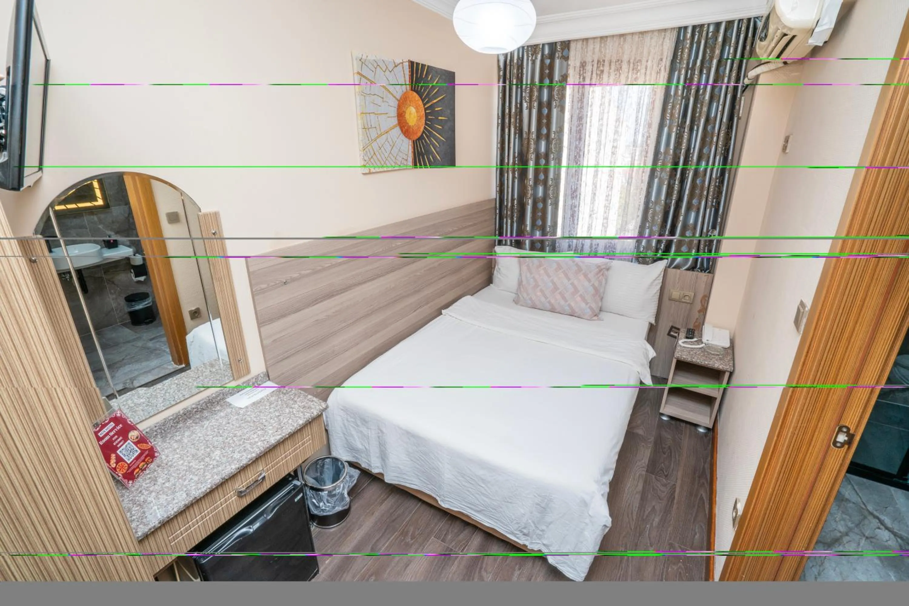 Bed in Grand Reis Hotel