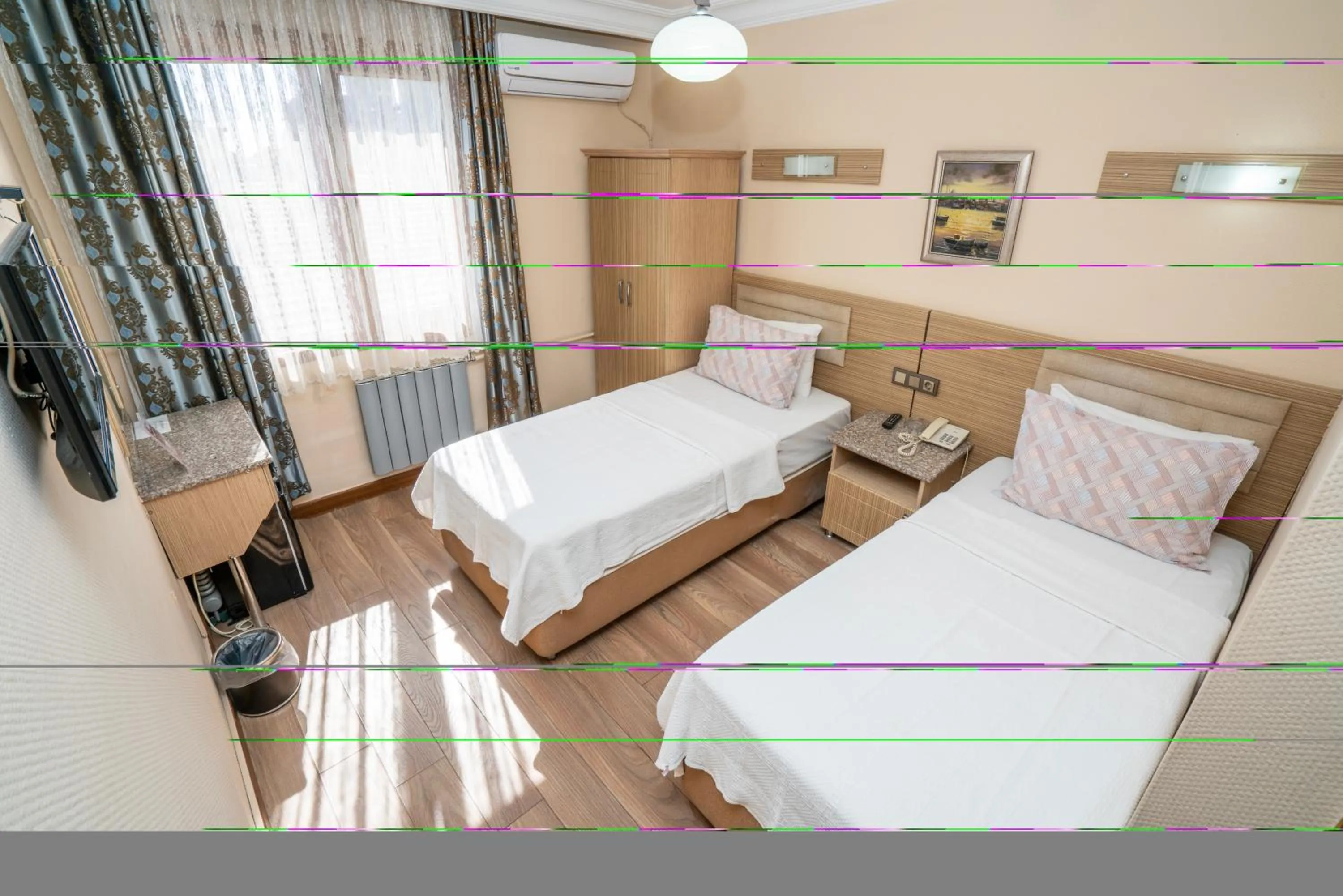 Bed in Grand Reis Hotel