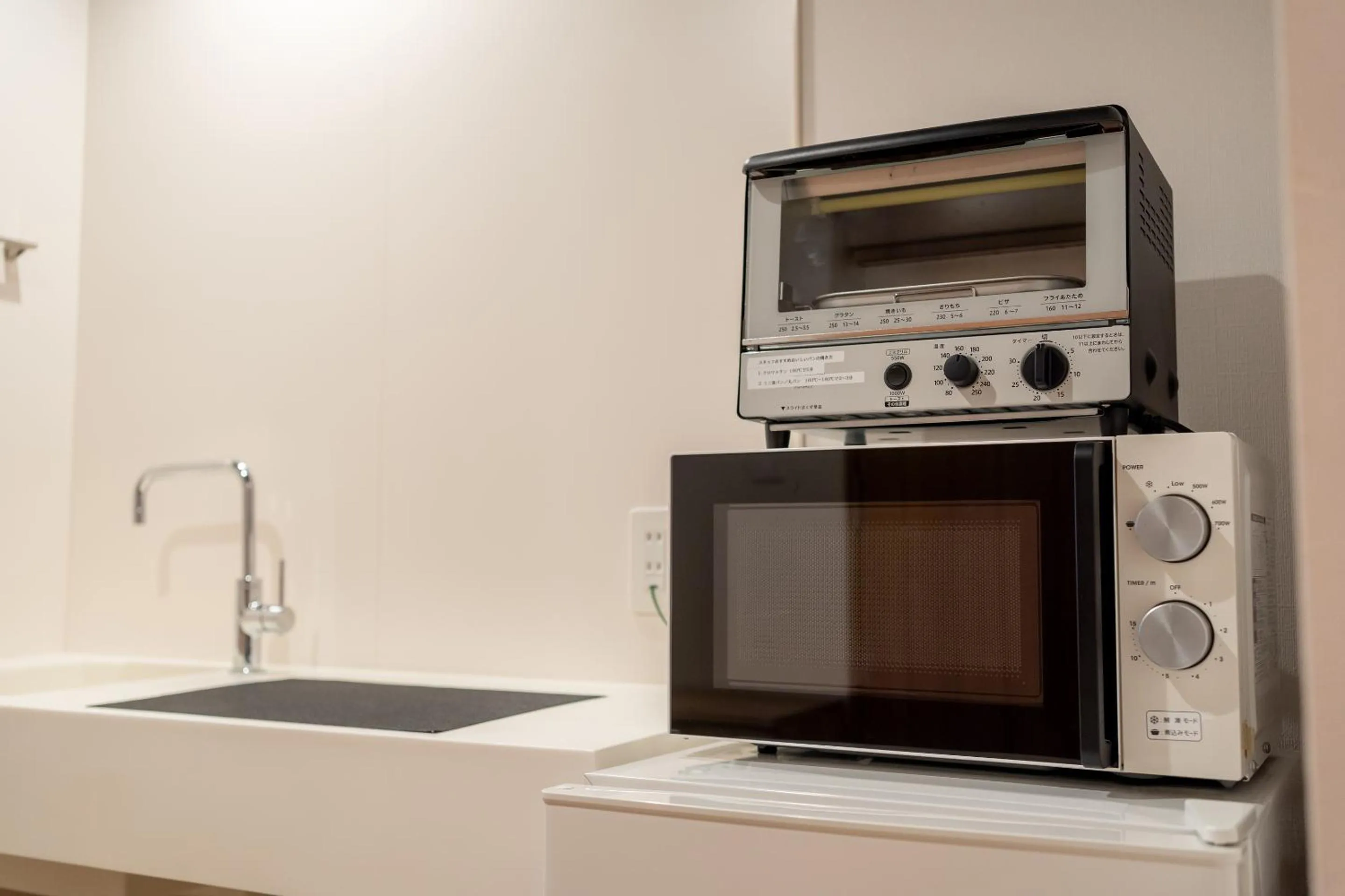 Kitchen or kitchenette in RESI STAY Hachi Inn