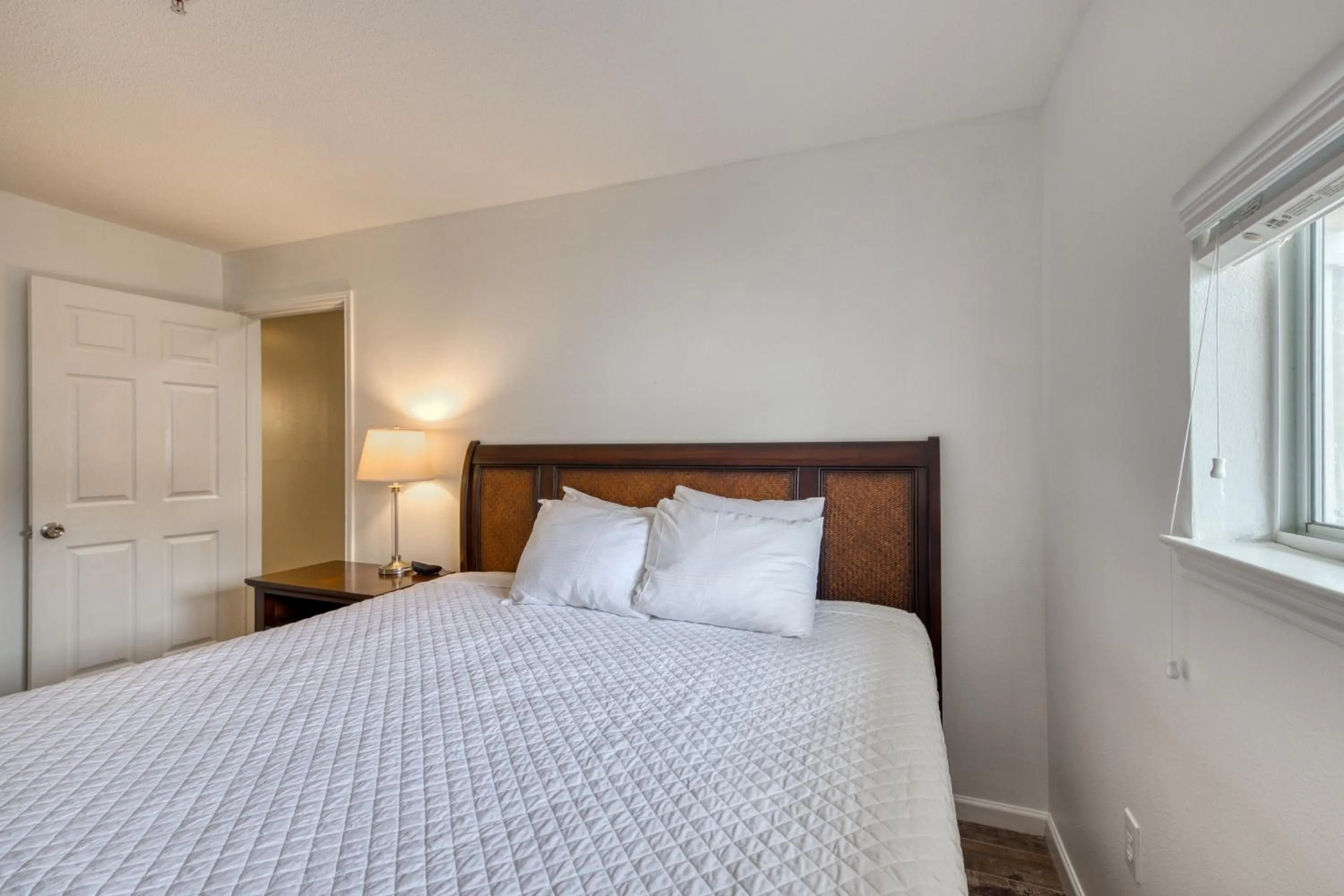 Bed in Crystal Sands Condominiums by ResortQuest