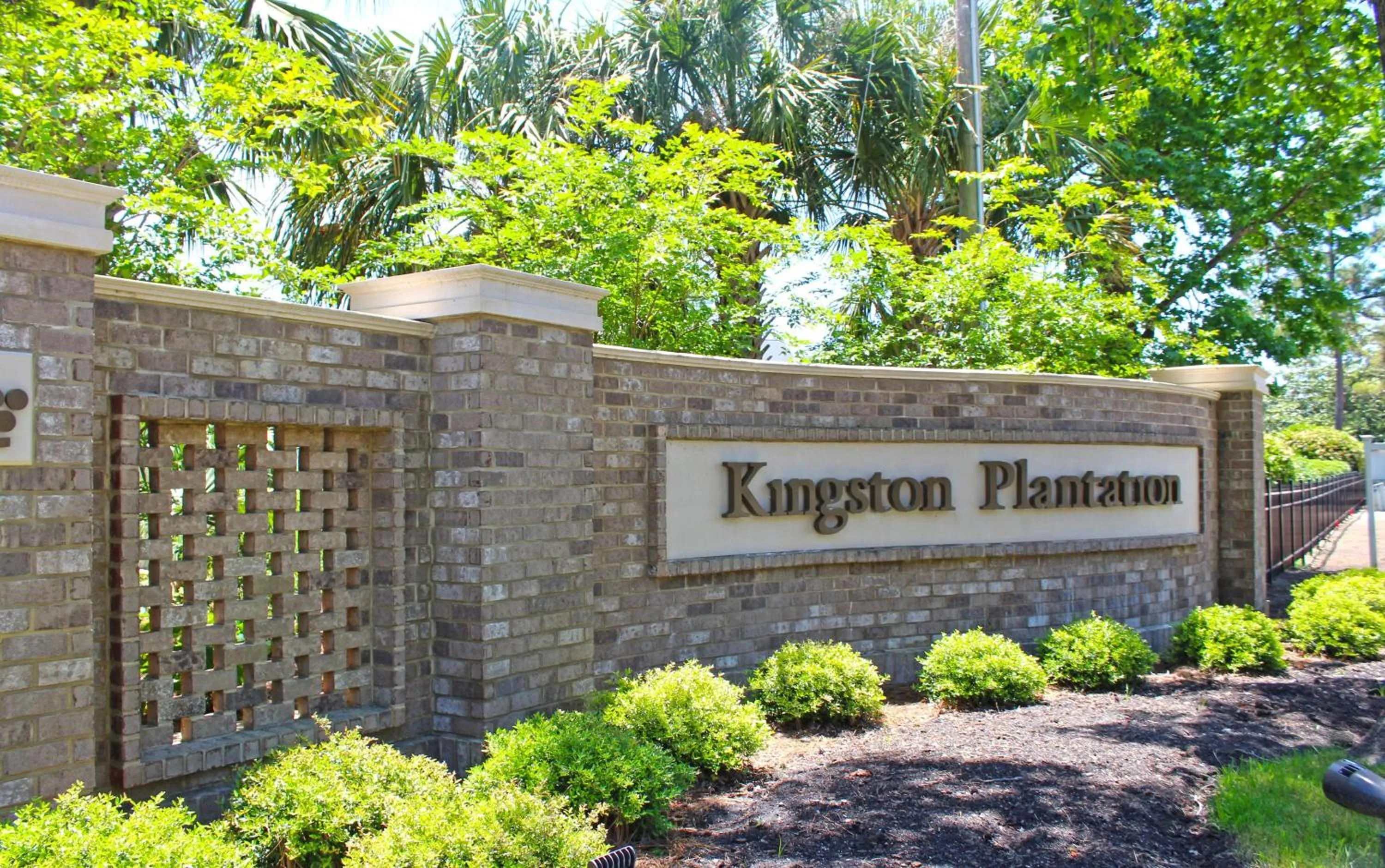 Property logo or sign in Palmetto Vacation Rentals at Kingston Plantation