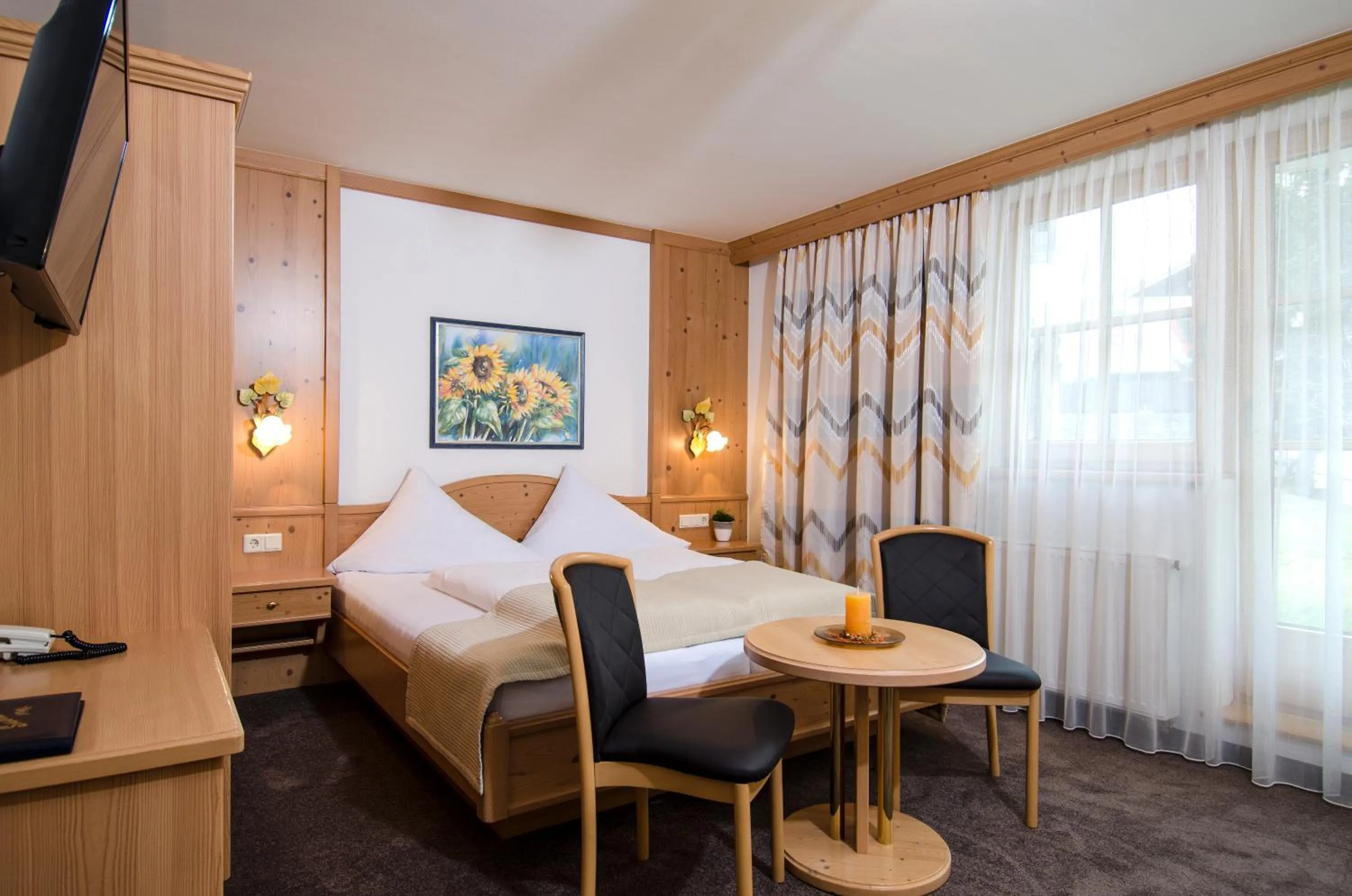 Bed in Hotel Garni Subretta