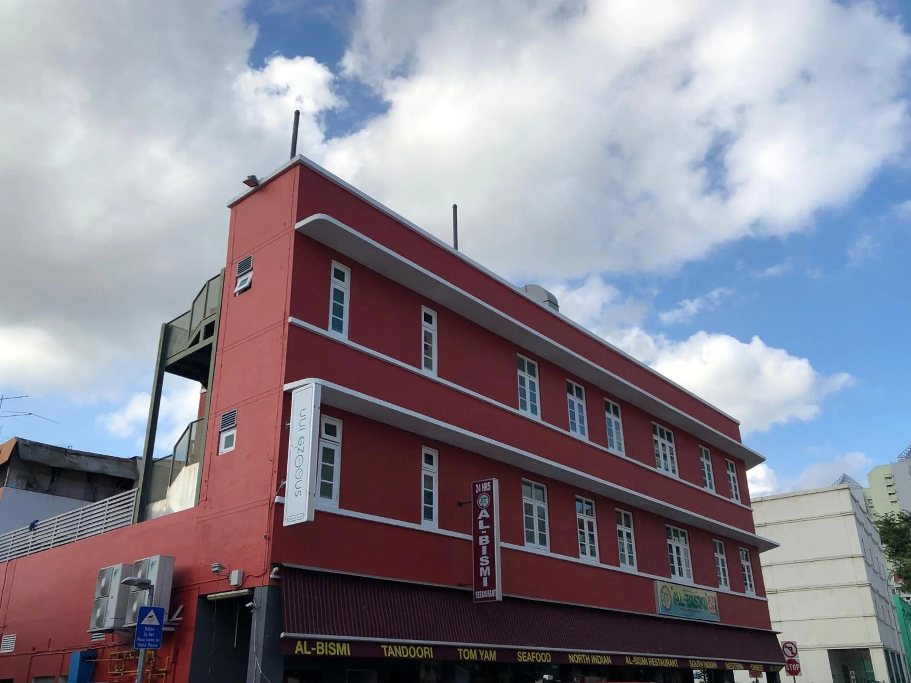 Property logo or sign in Snooze Inn @Dickson Road