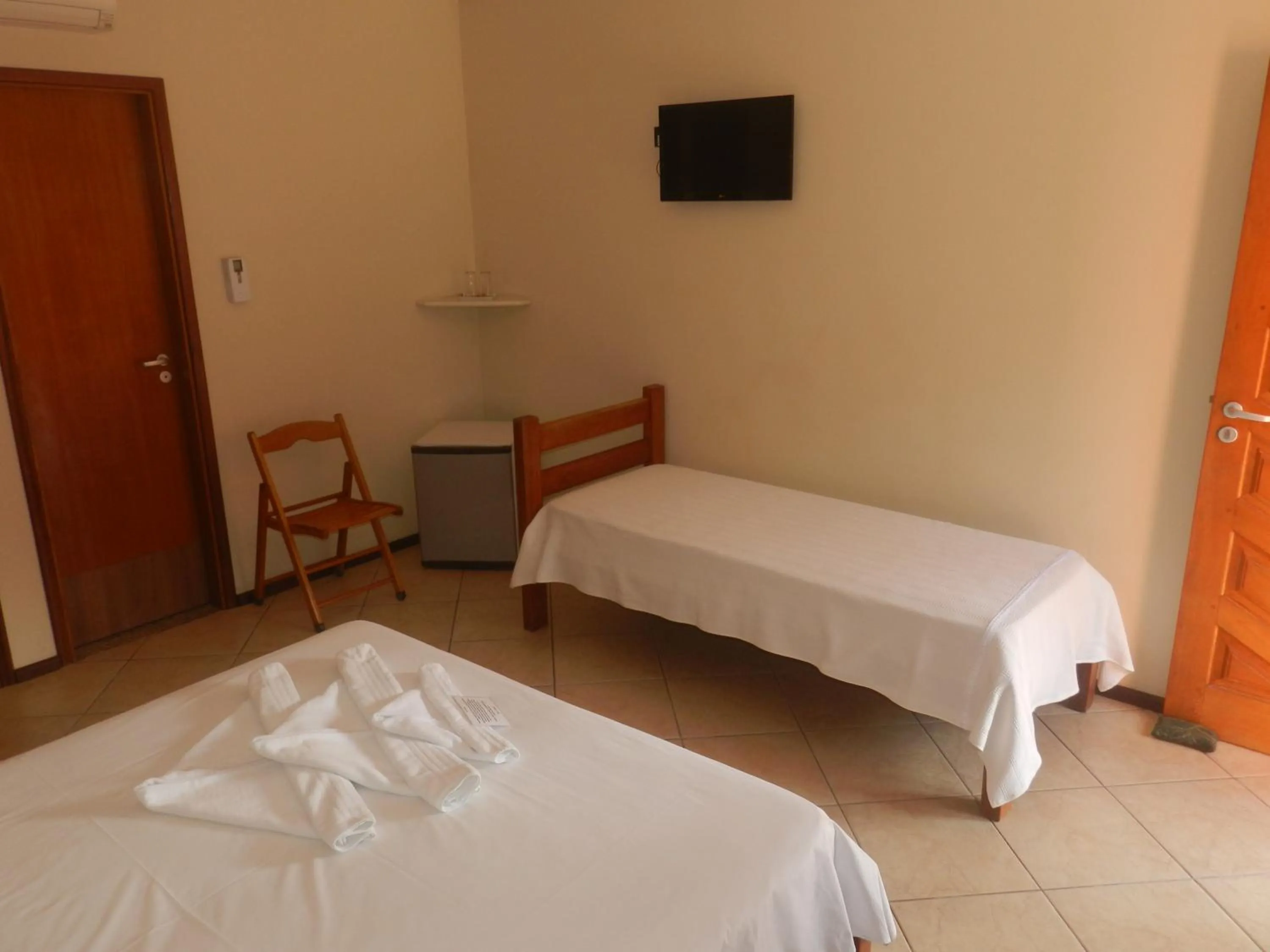 Bed in Pousada Tempo Rei