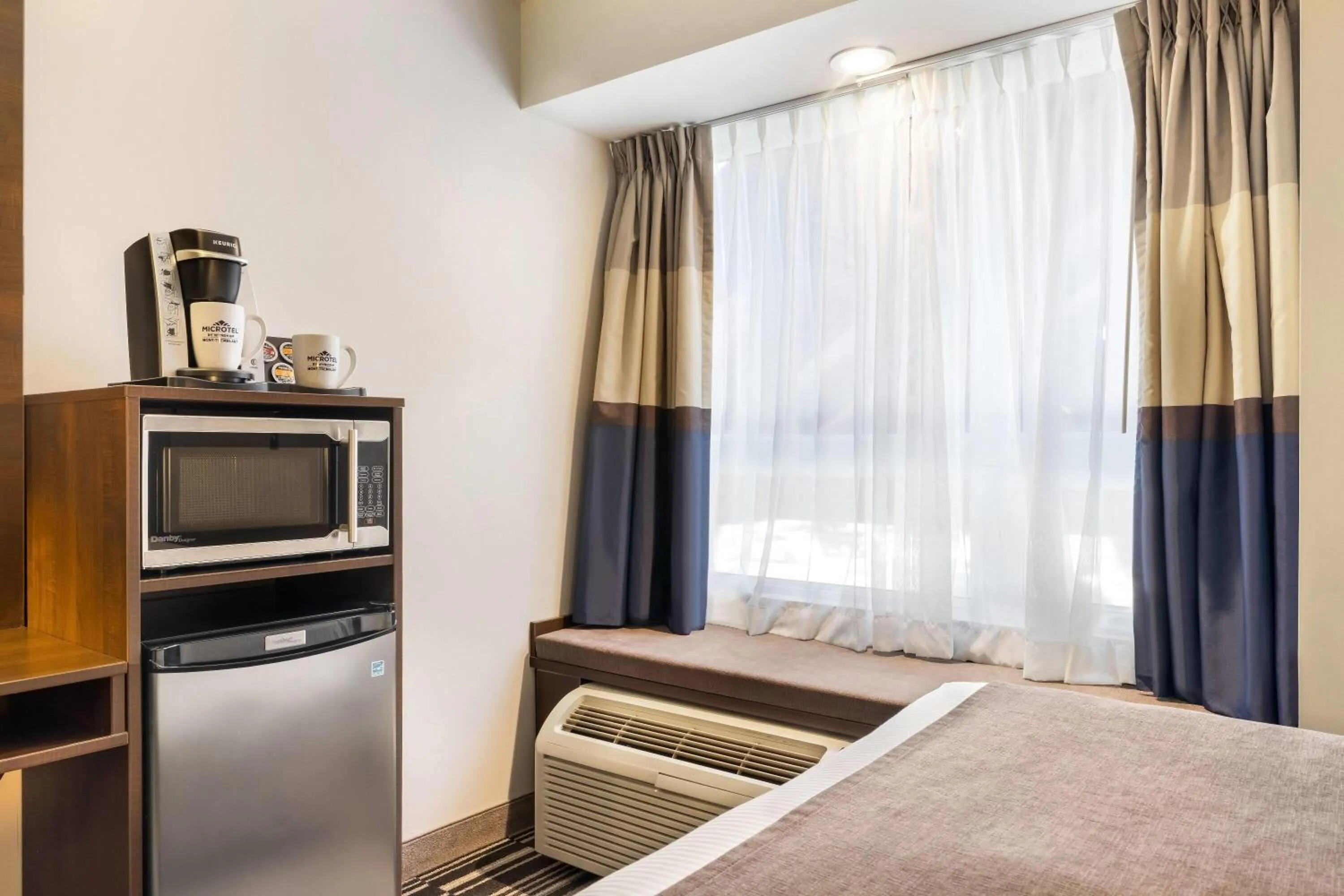 Bed in Microtel Inn & Suites by Wyndham Mont Tremblant