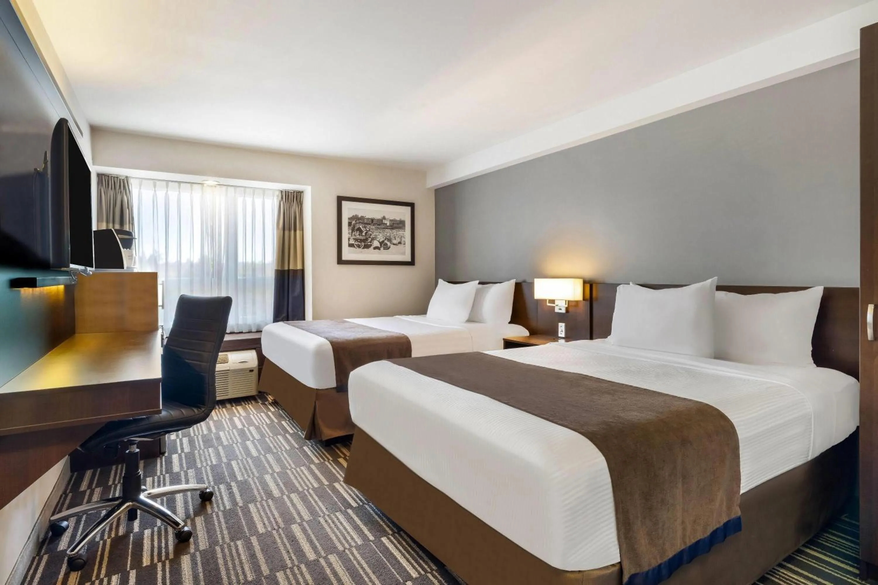 Bed in Microtel Inn & Suites by Wyndham Mont Tremblant