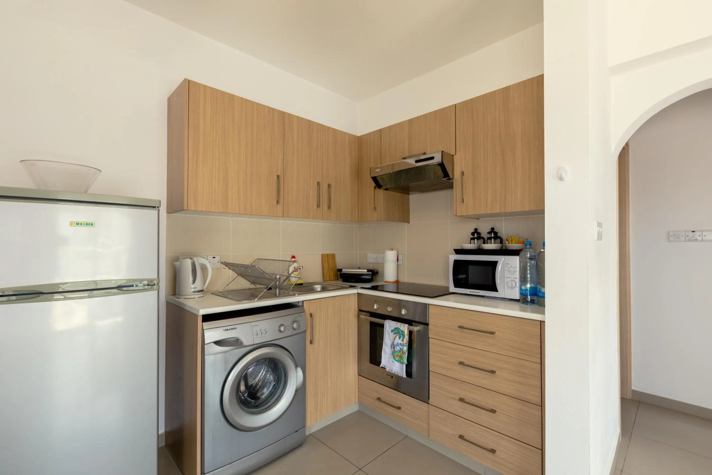 Kitchen or kitchenette in Oceania Bay Village