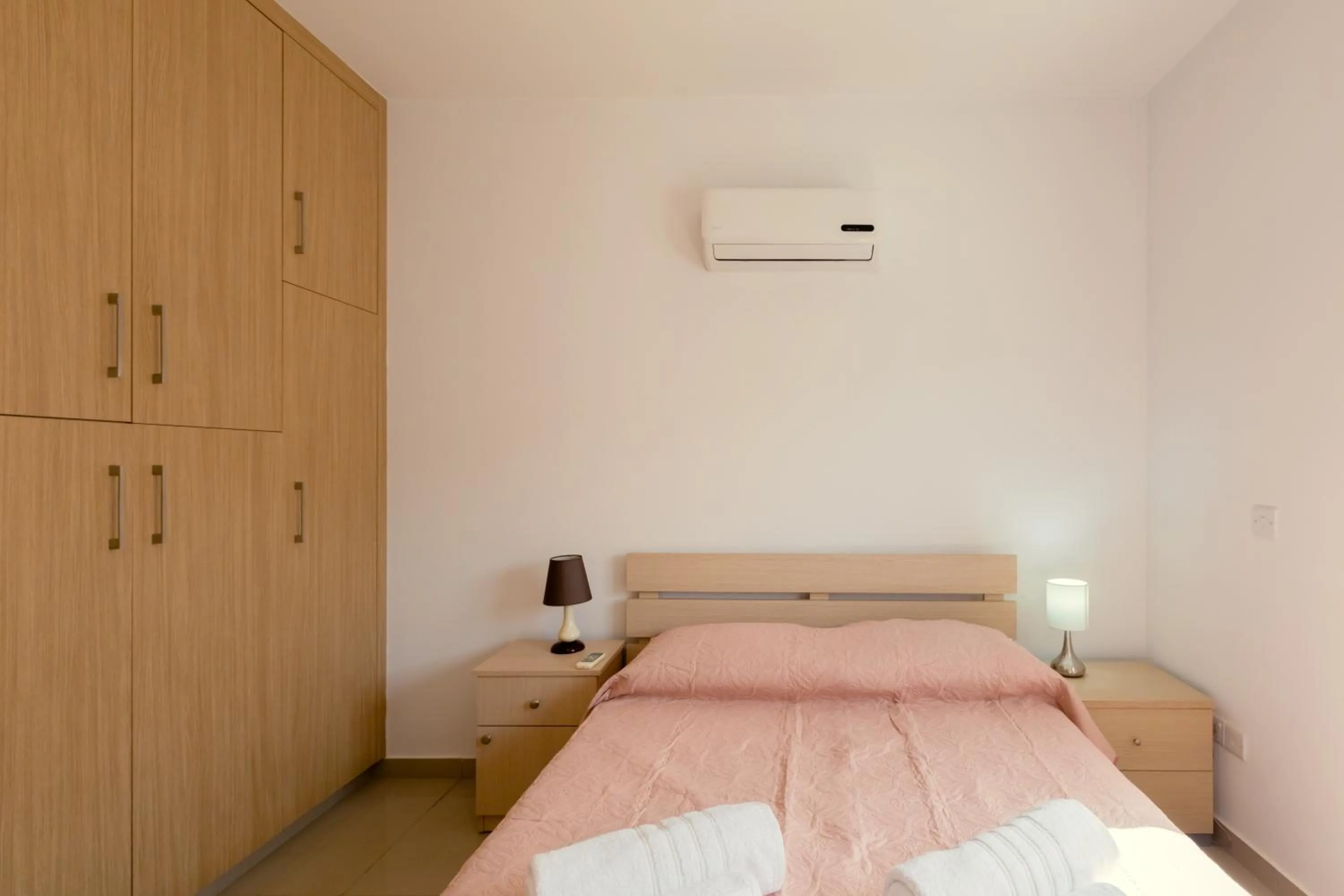 Bed in Oceania Bay Village