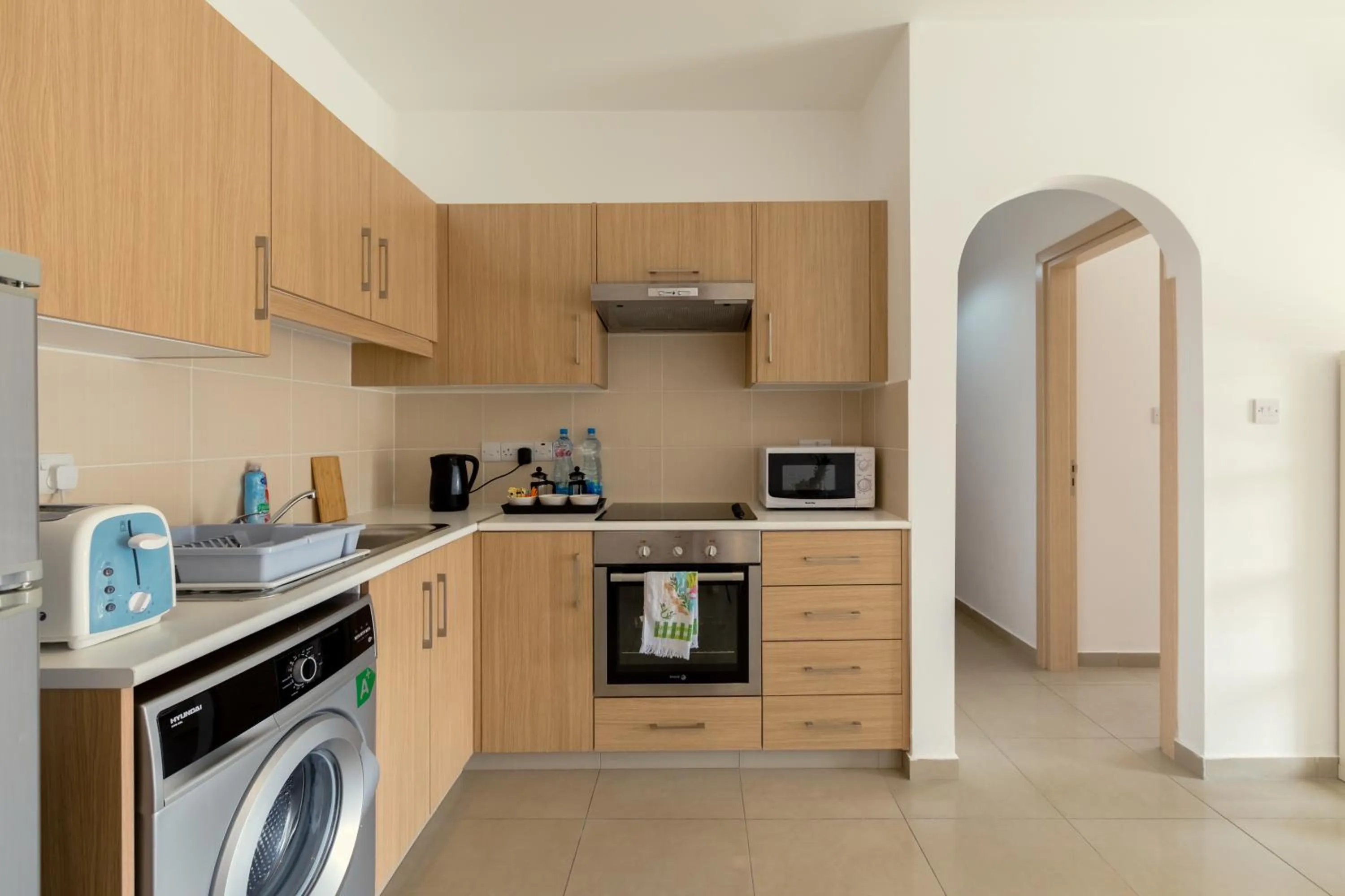 Kitchen or kitchenette in Oceania Bay Village