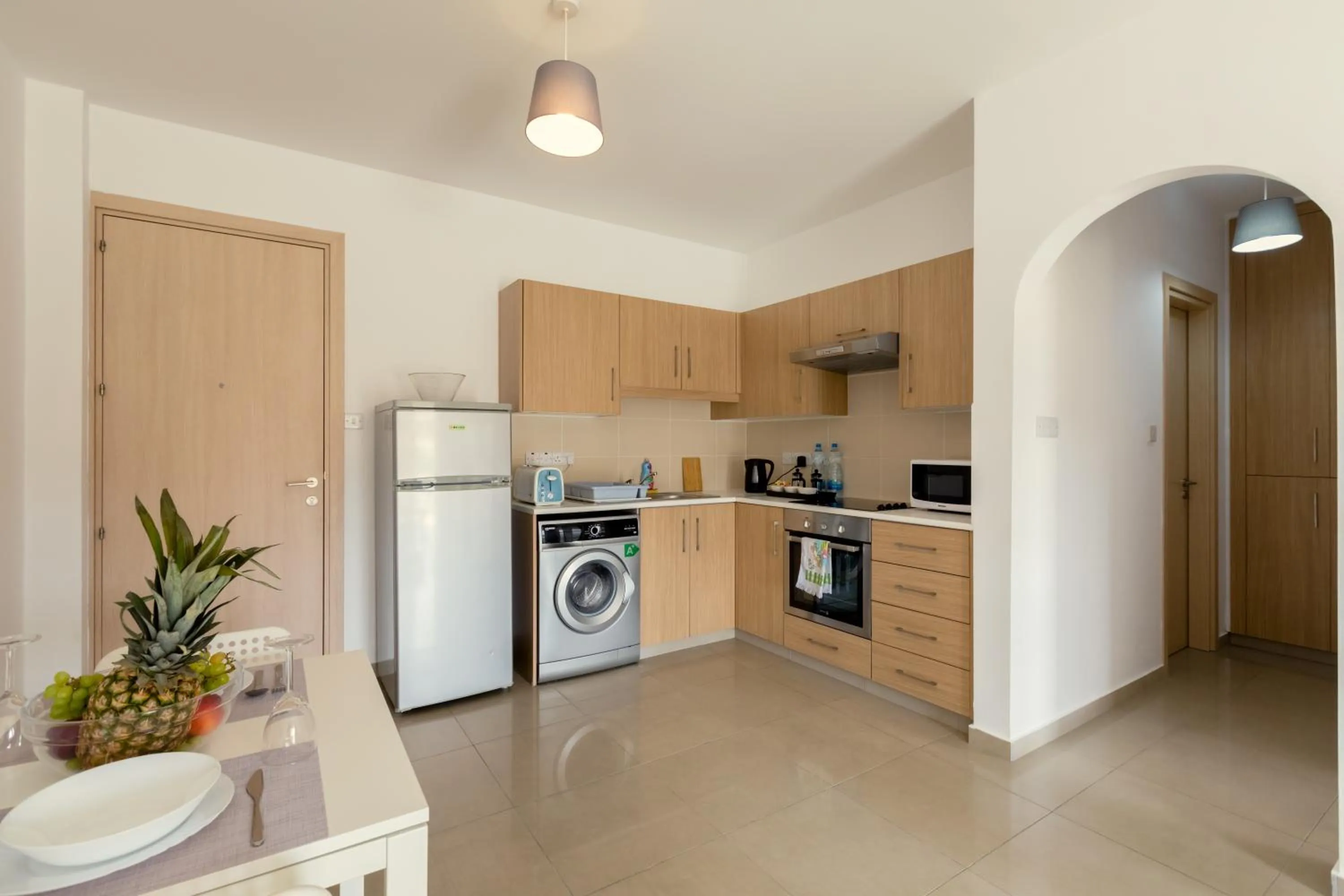 Kitchen or kitchenette in Oceania Bay Village