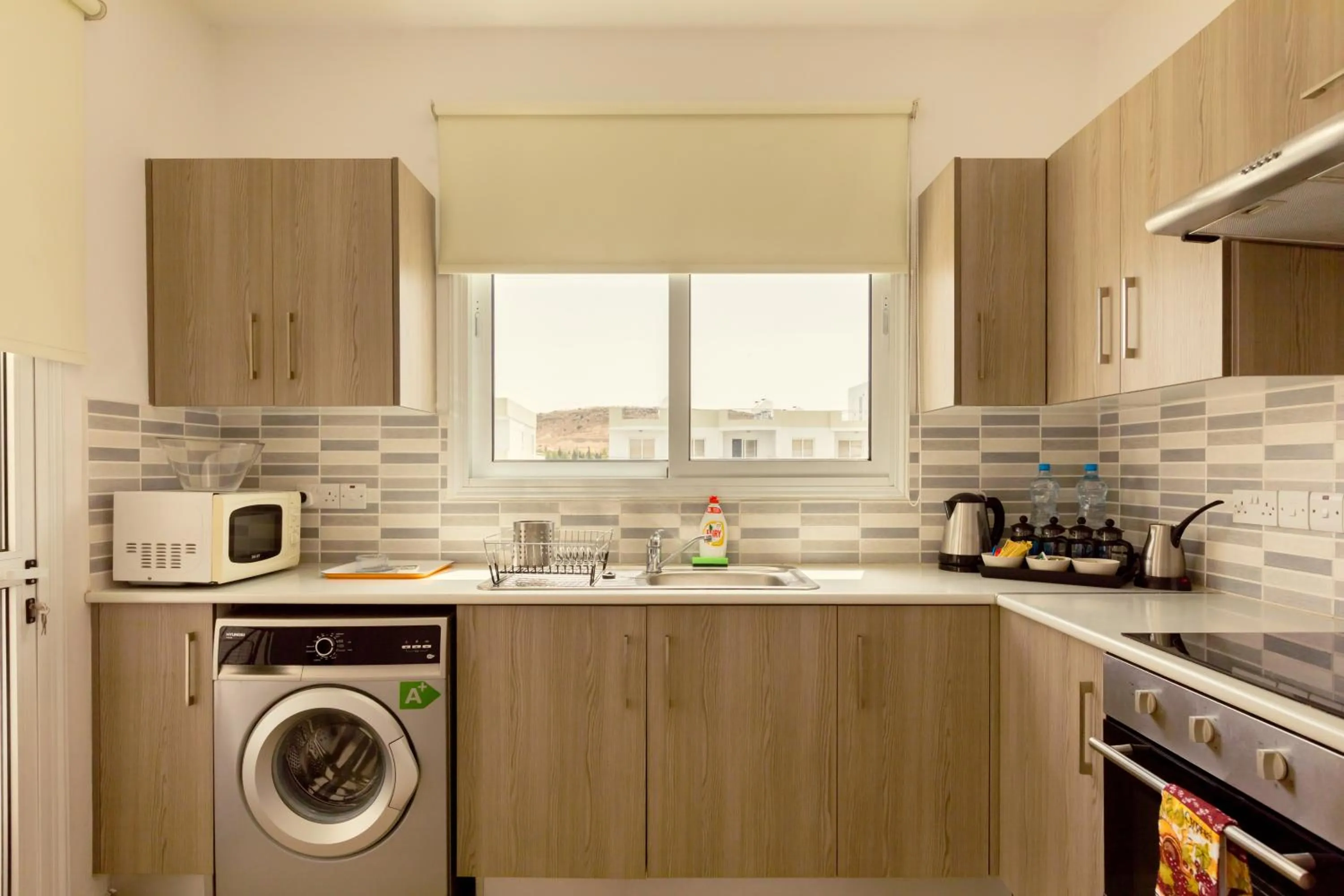 Kitchen or kitchenette in Oceania Bay Village