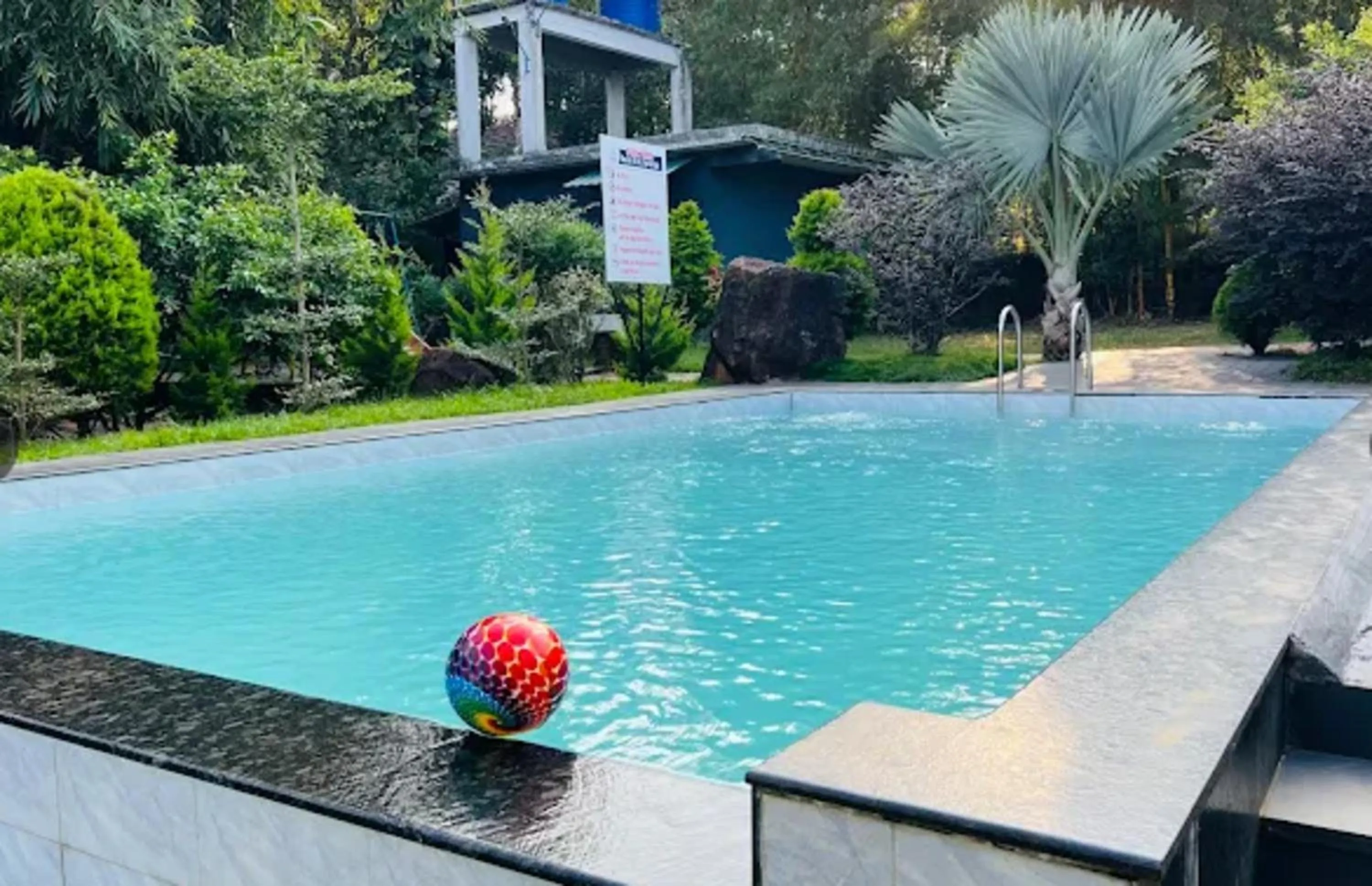 Swimming pool in Le Eden Premium Wayanad Pool Resort