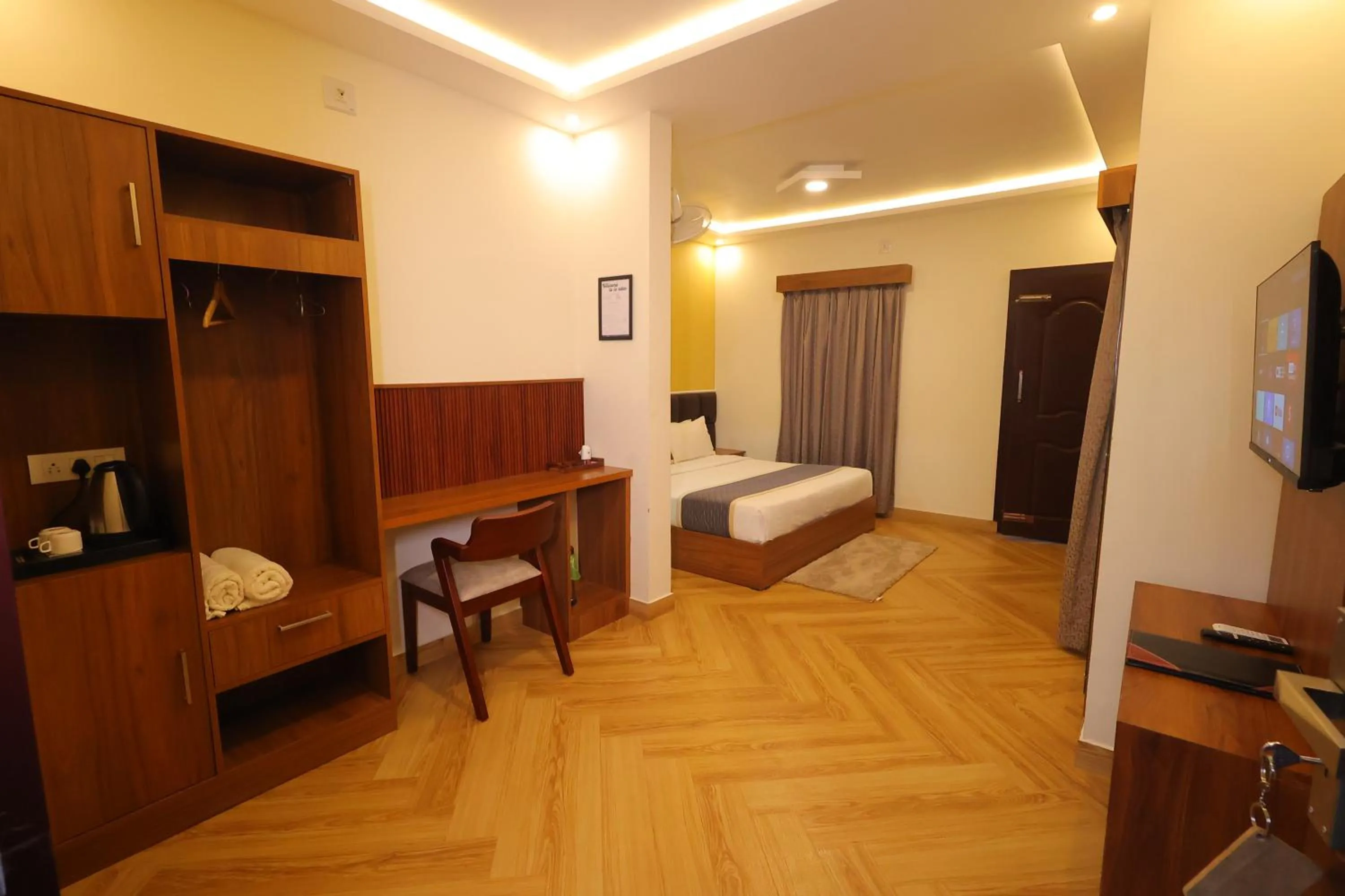 Bed in Le Eden Premium Wayanad Pool Resort