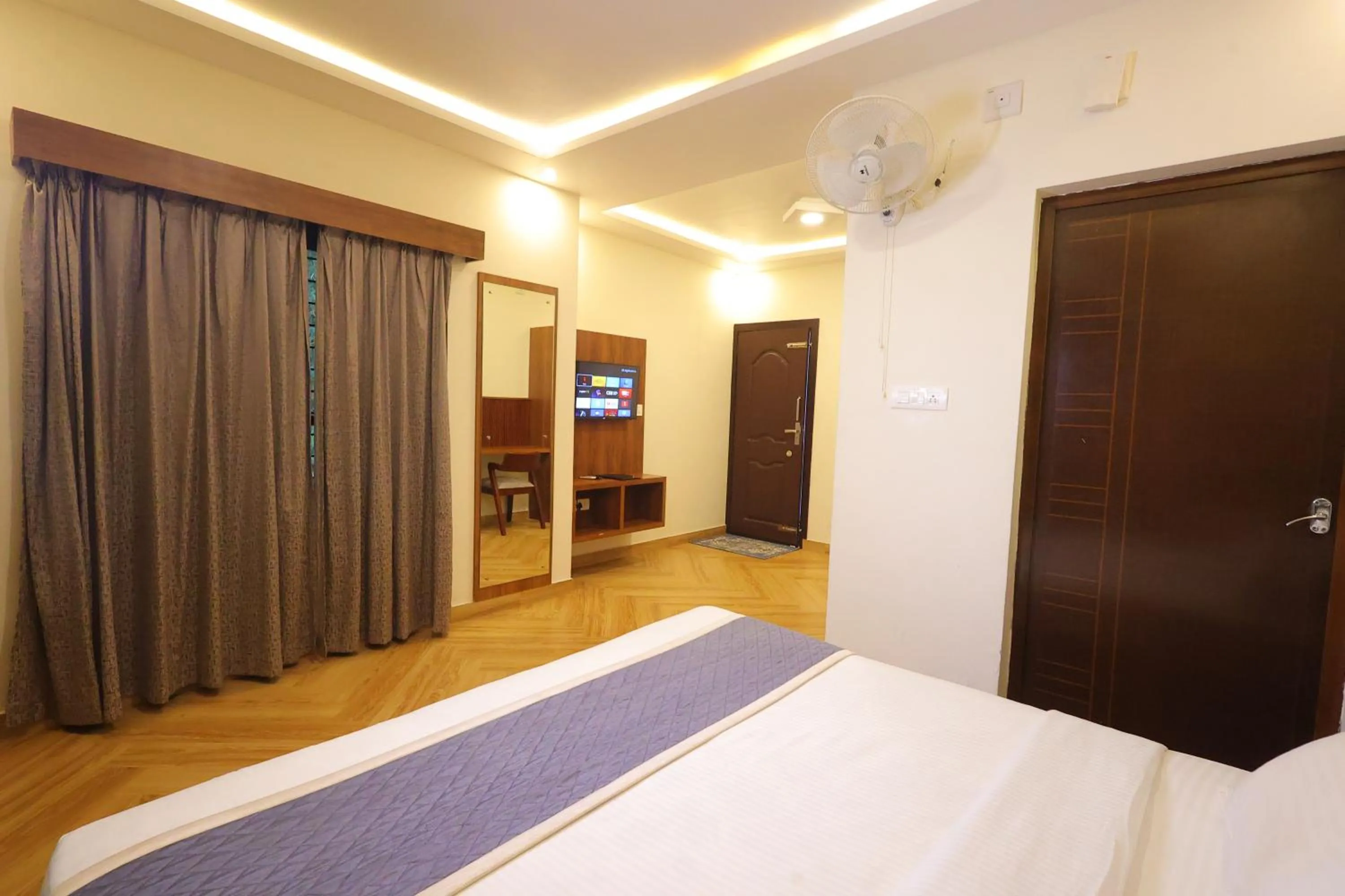 Bed in Le Eden Premium Wayanad Pool Resort
