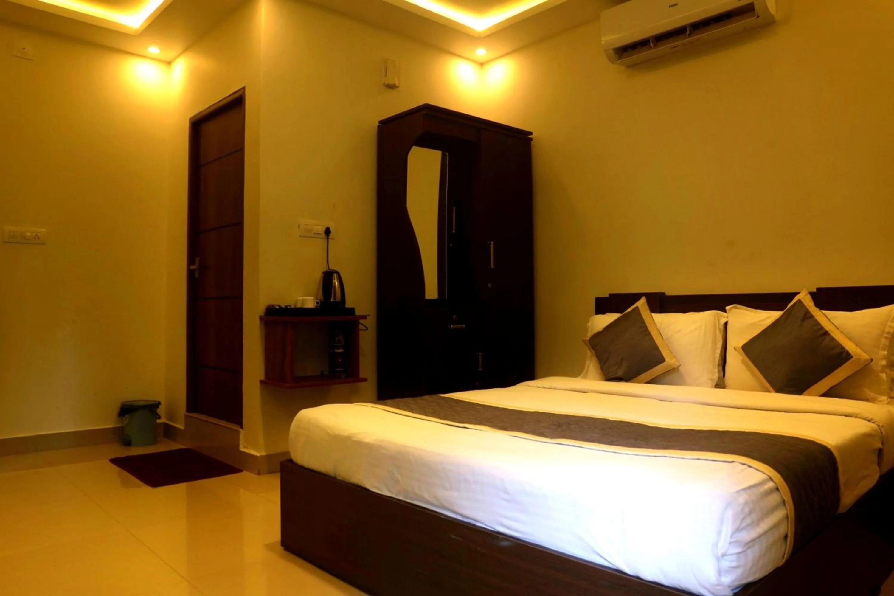 Bed in Le Eden Premium Wayanad Pool Resort