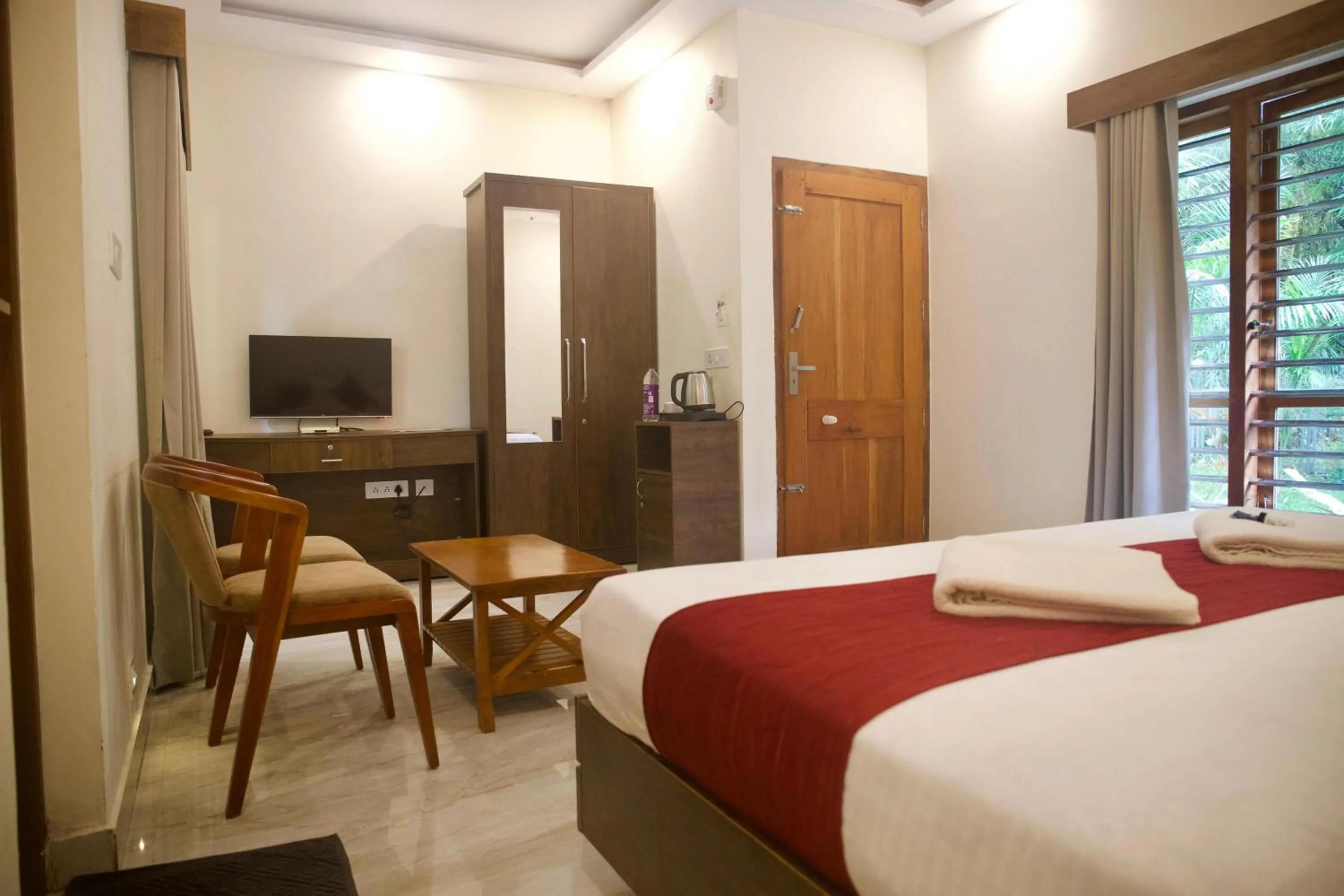 Photo of the whole room, Bed in Le Eden Premium Wayanad Pool Resort