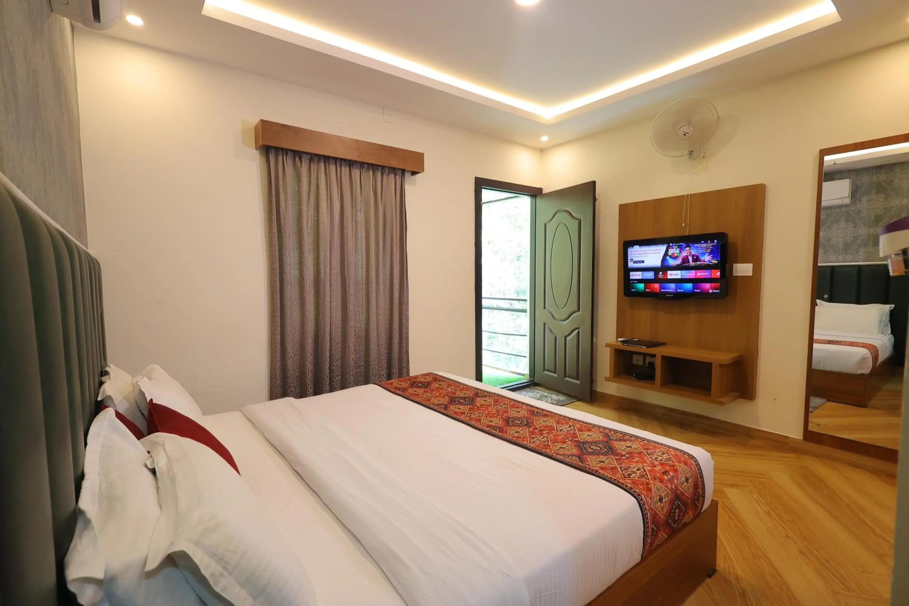 Bed in Le Eden Premium Wayanad Pool Resort