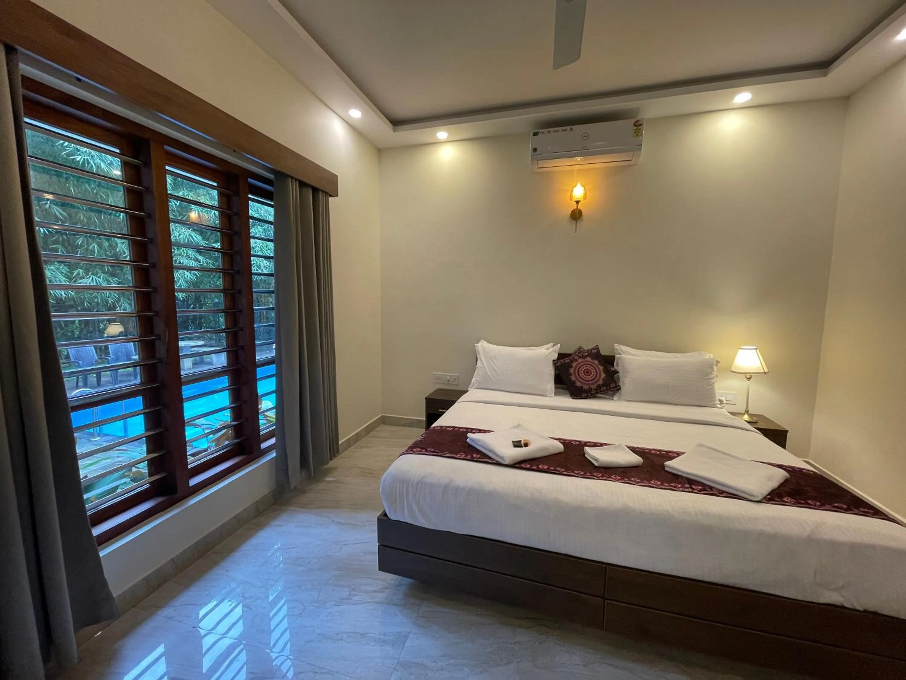 Photo of the whole room, Bed in Le Eden Premium Wayanad Pool Resort