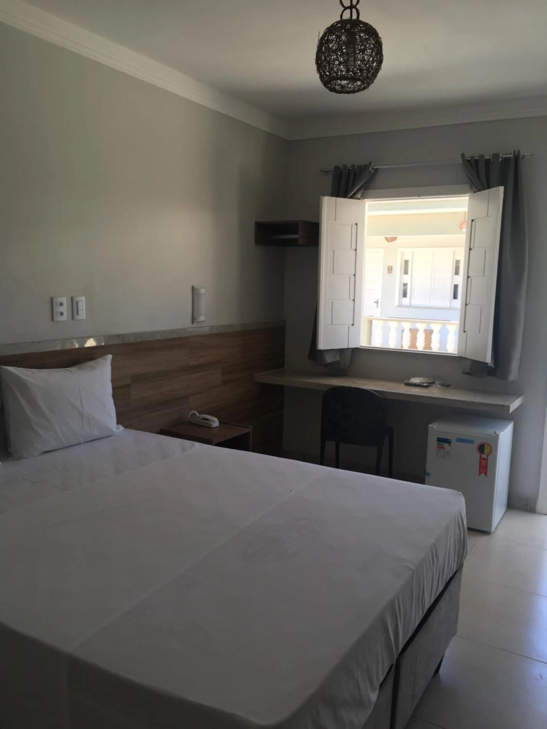 Bed in Tropical Mar Hotel