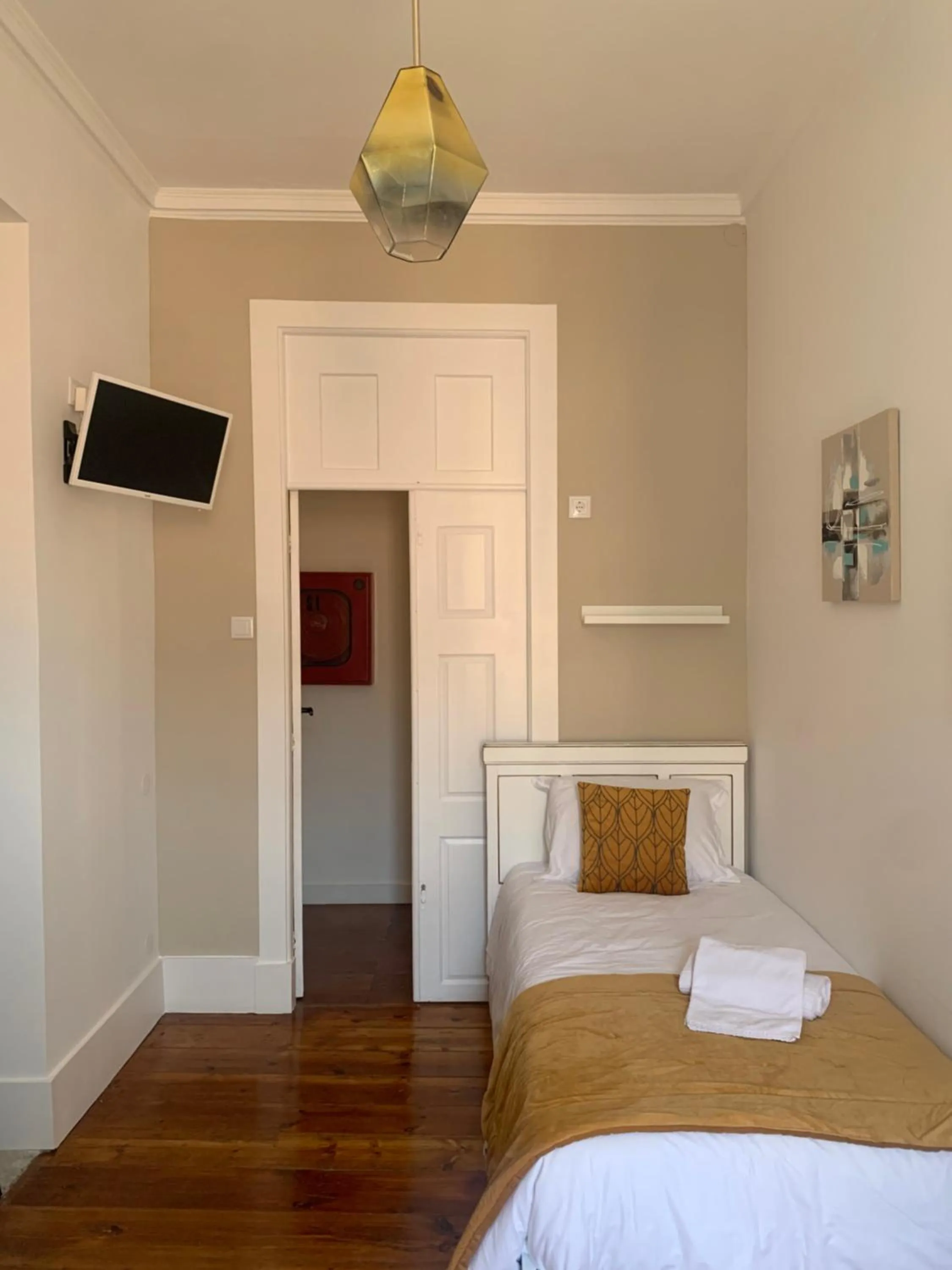 Bed in A Portuguesa Guest House