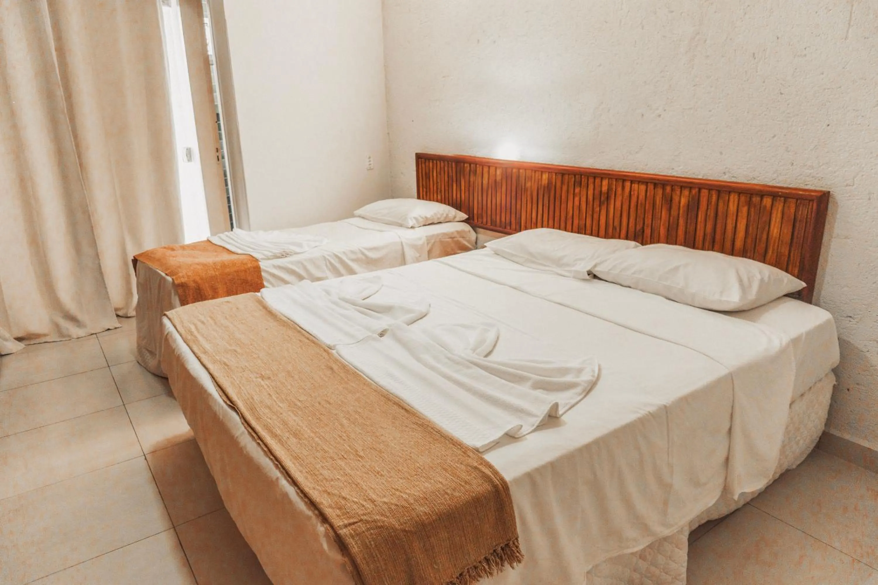 Bed in Garça Branca Praia Hotel