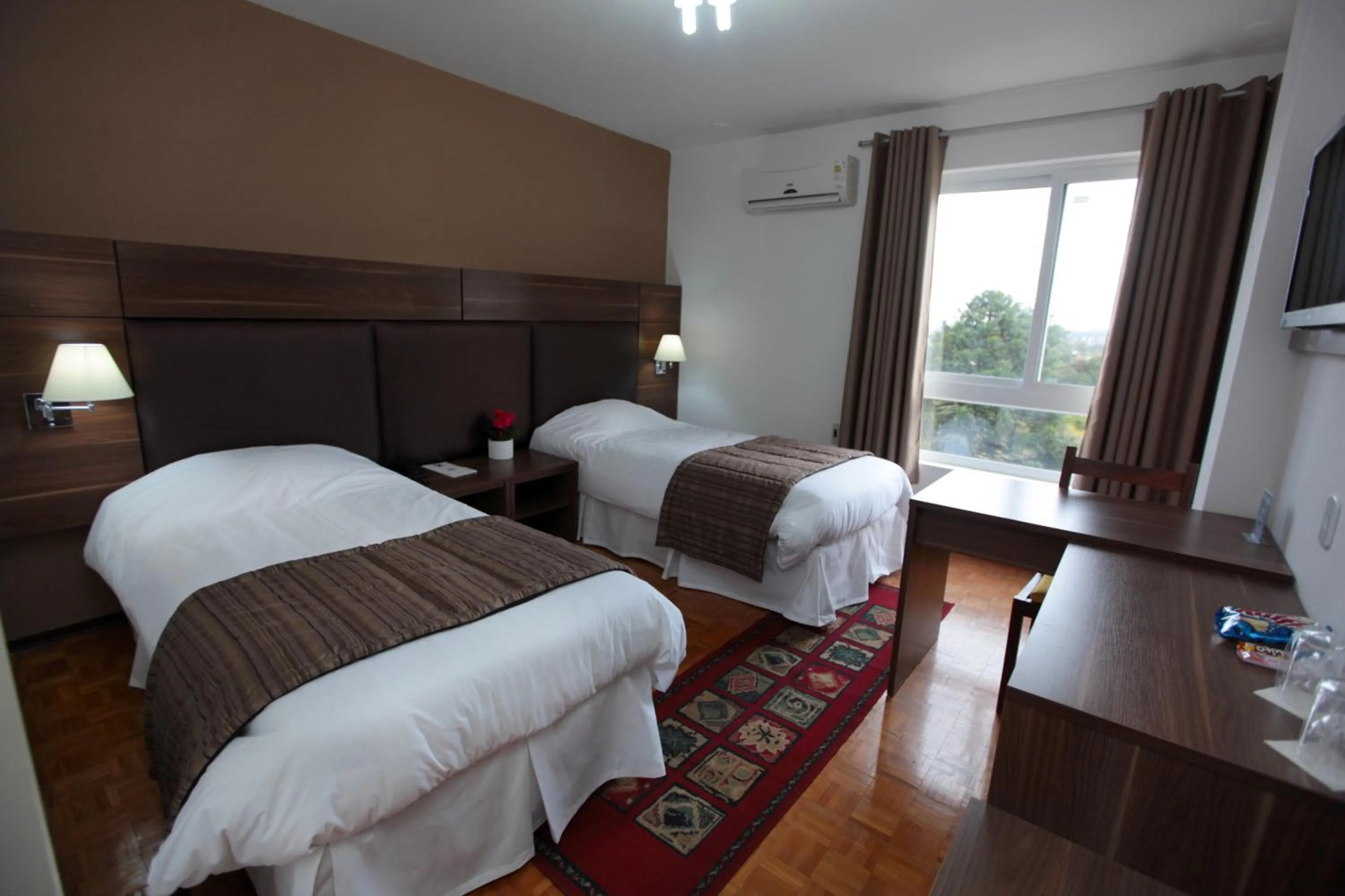 Photo of the whole room, Bed in Hotel Obino Bagé