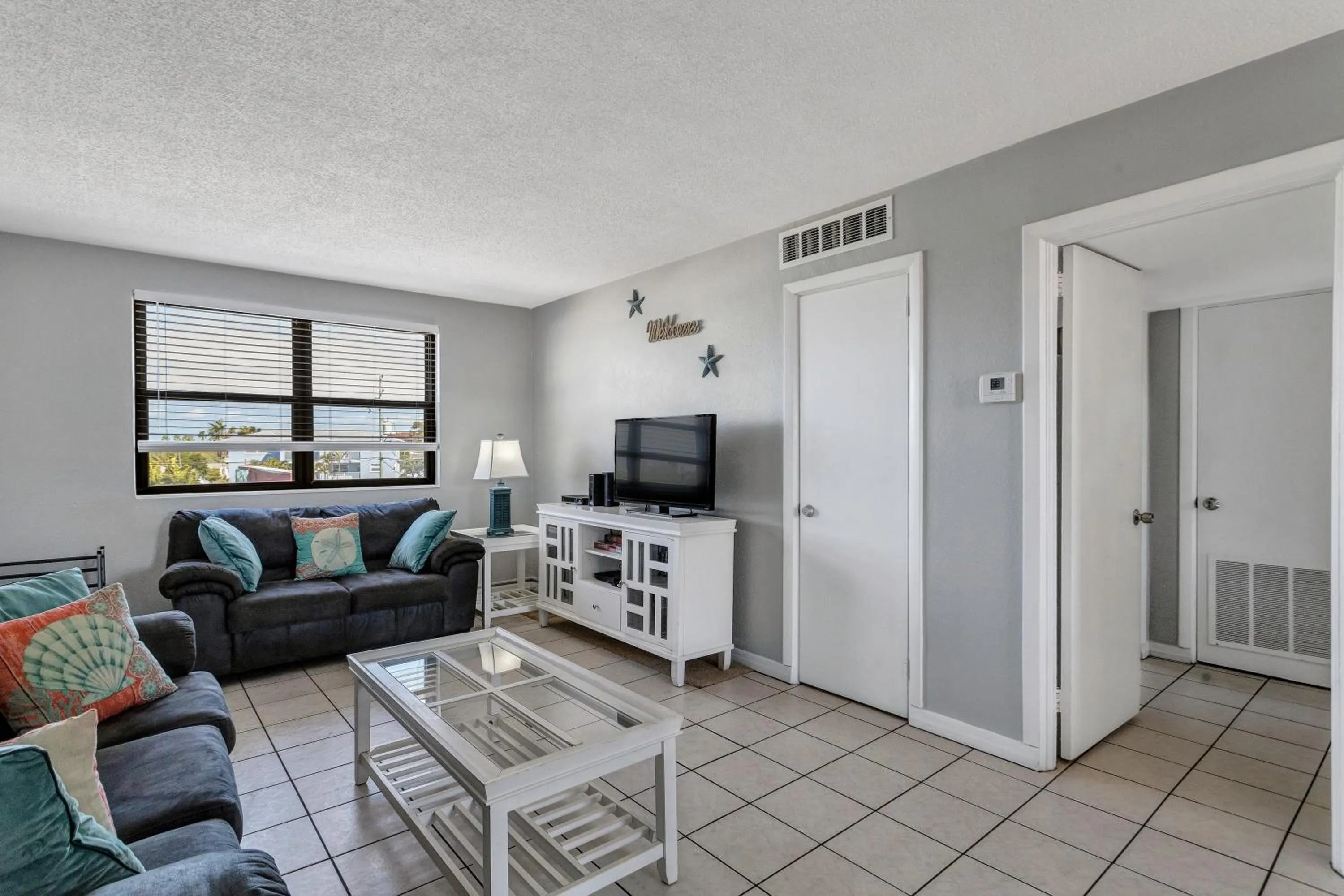 Living room in Gulf Winds Resort by Travel Resort Services