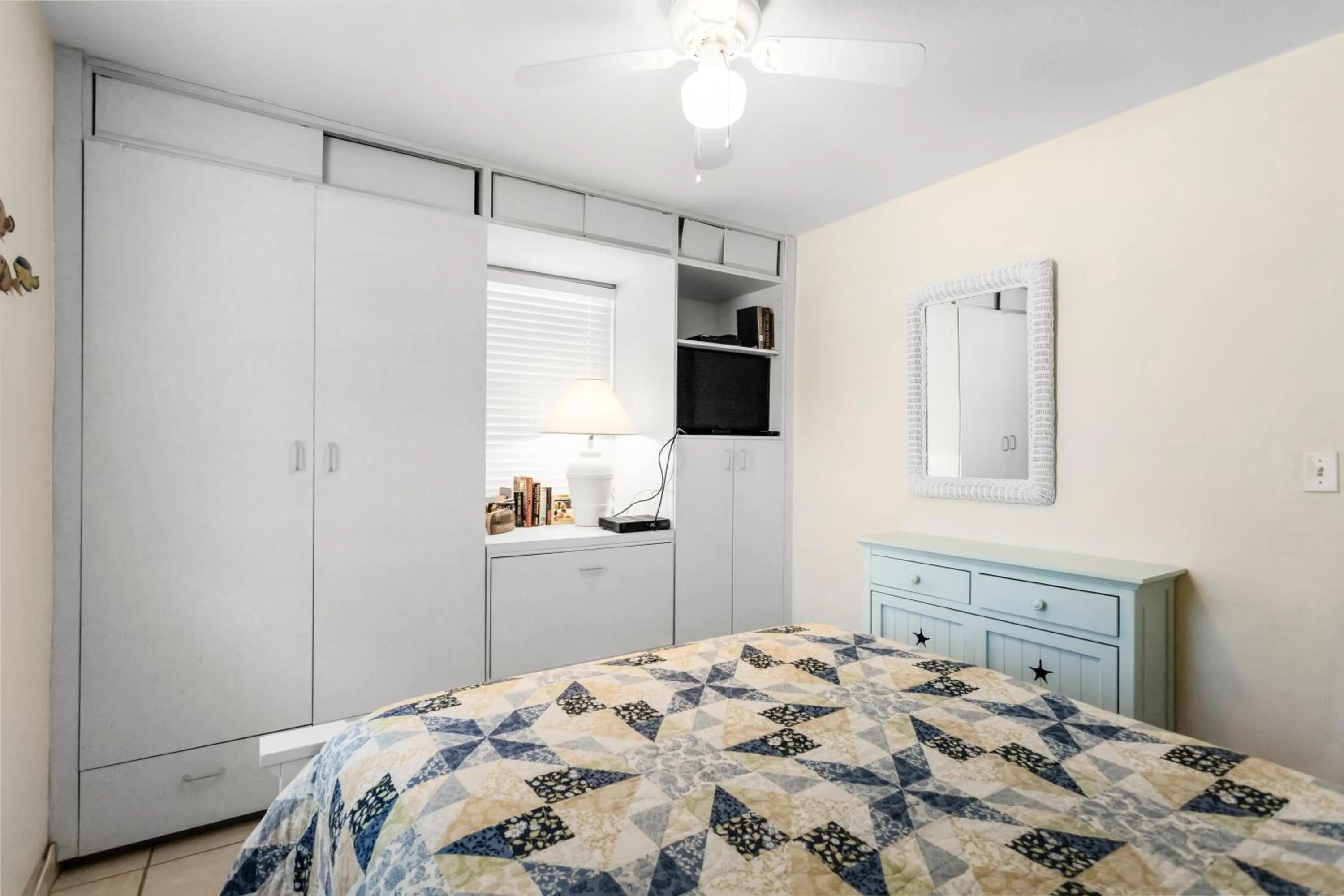 Bed in Gulf Winds Resort by Travel Resort Services